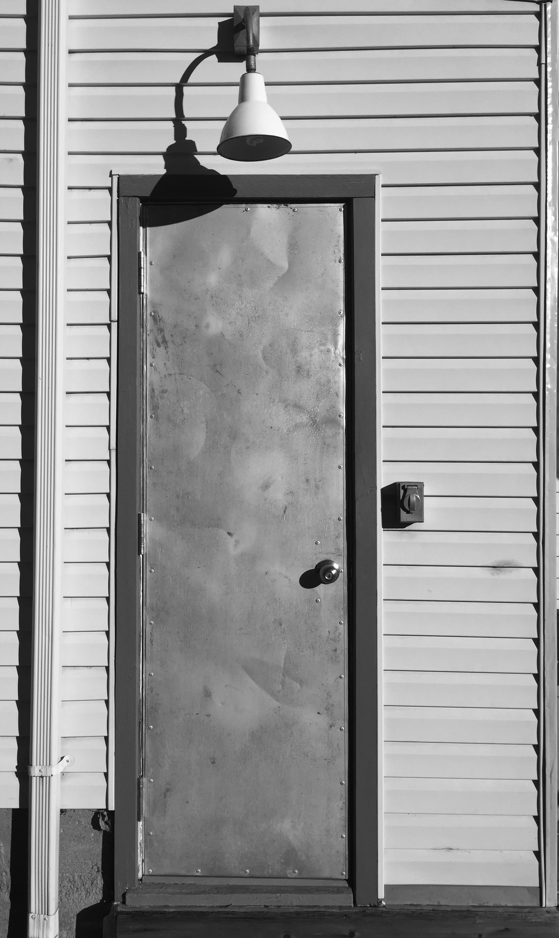 The side door to Noah Harpham's apartment.