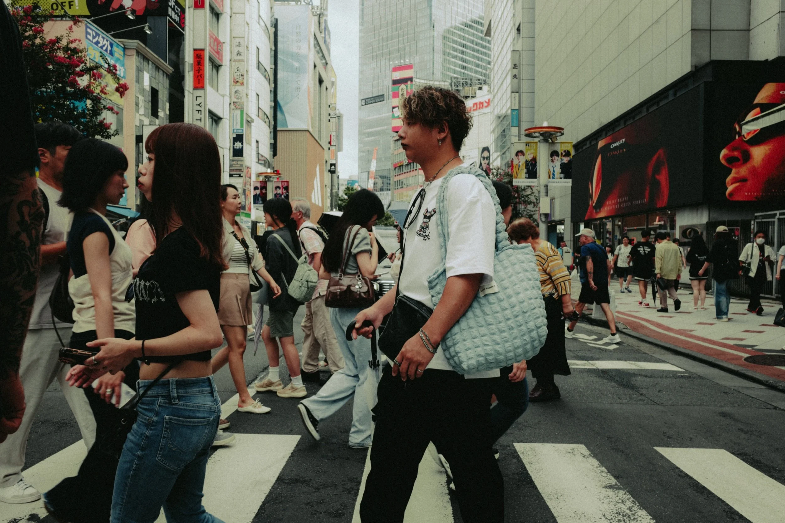 Tokyo — people moving through a city crossing