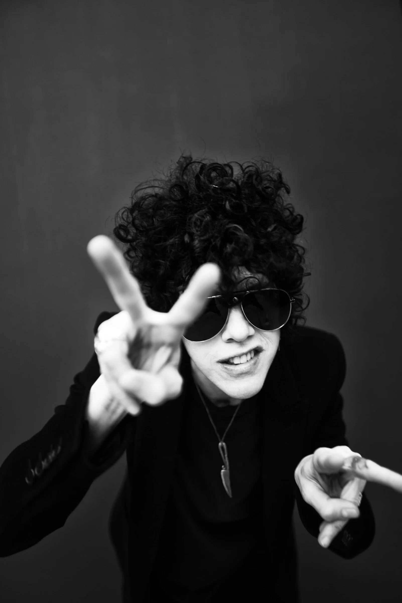 LP — expressive portrait with hand gesture