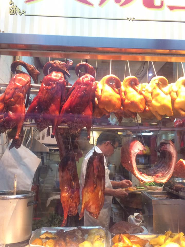 Pick a fowl, any fowl.... another street vendor selling his meat...