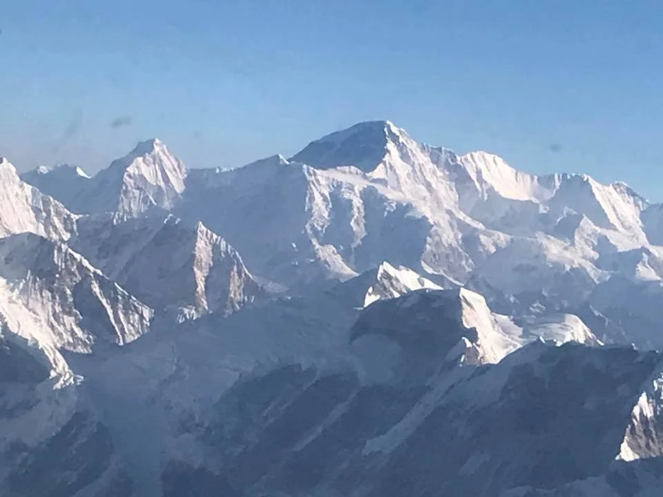 Note: that peak is NOT Mount Everest - but it's one of the pics that came out ok from my iPhone so it'll do. Pardon the dirt on the pic - the airplane window was dirty.