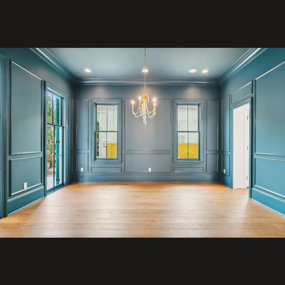 Make a statement with a bold color and wall paneling. Sophisticated yet elegant.  #boldrooms #color #diningrooms #gardendistrict #neworleans #gulfstatesconstruction