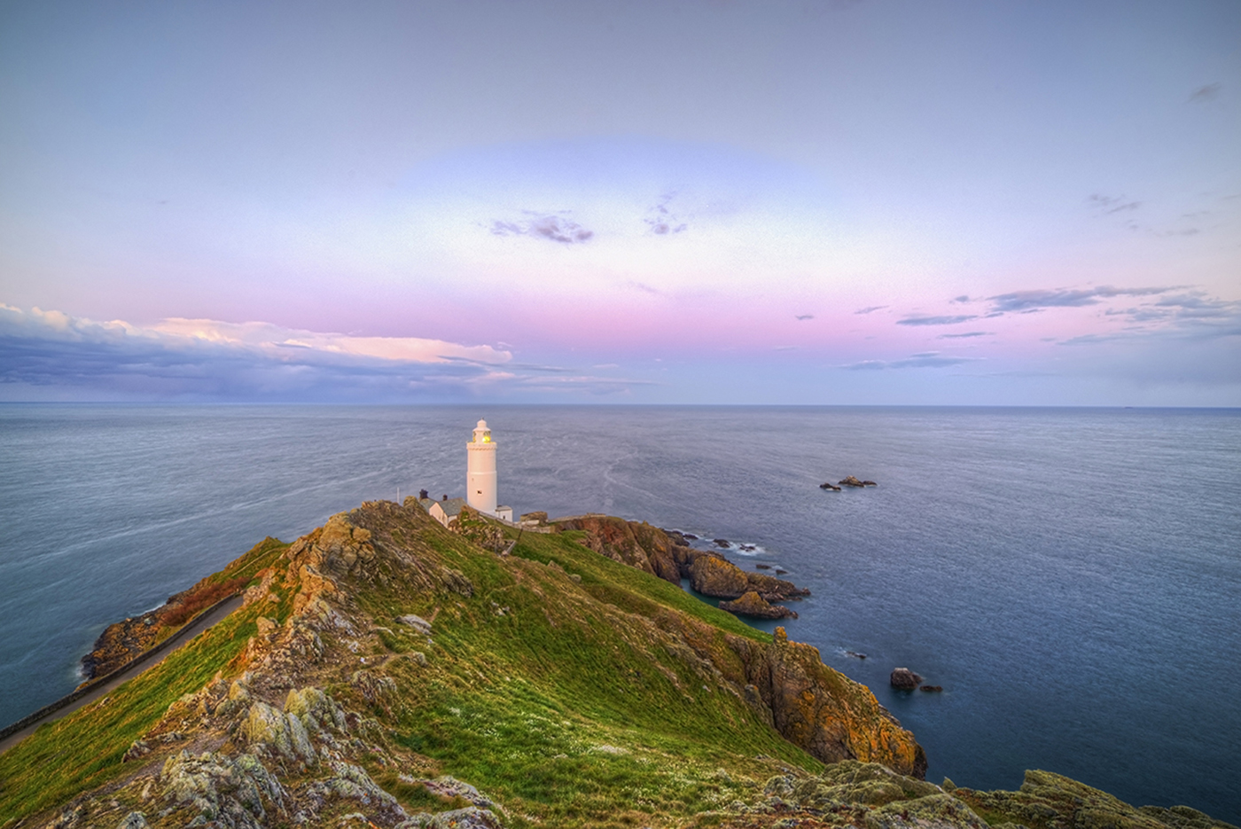 Start point lighthouse during a pink sunset