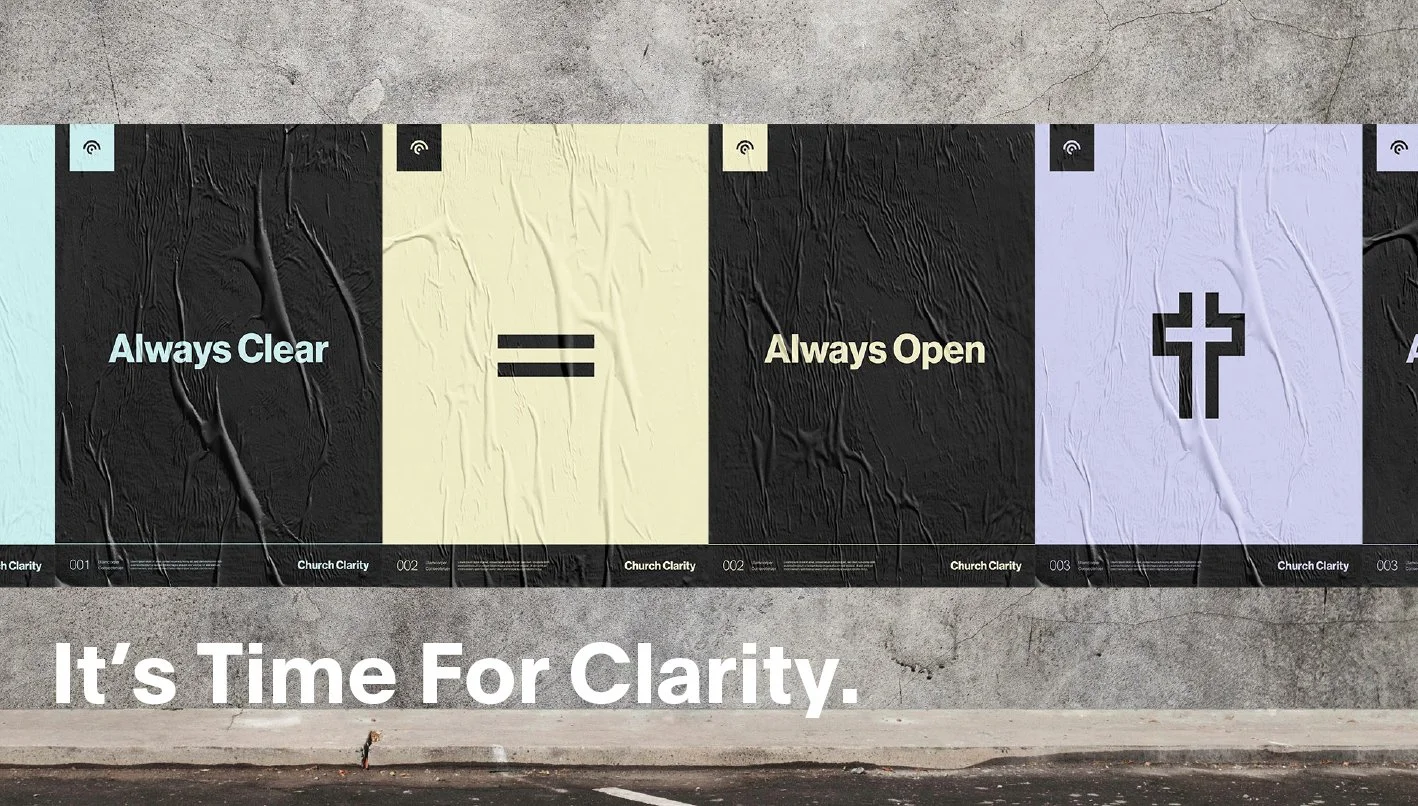 A wall mural with colored panels and text promoting clarity in communication, stating 'Always Clear = Always Open' and 'It's Time For Clarity.'