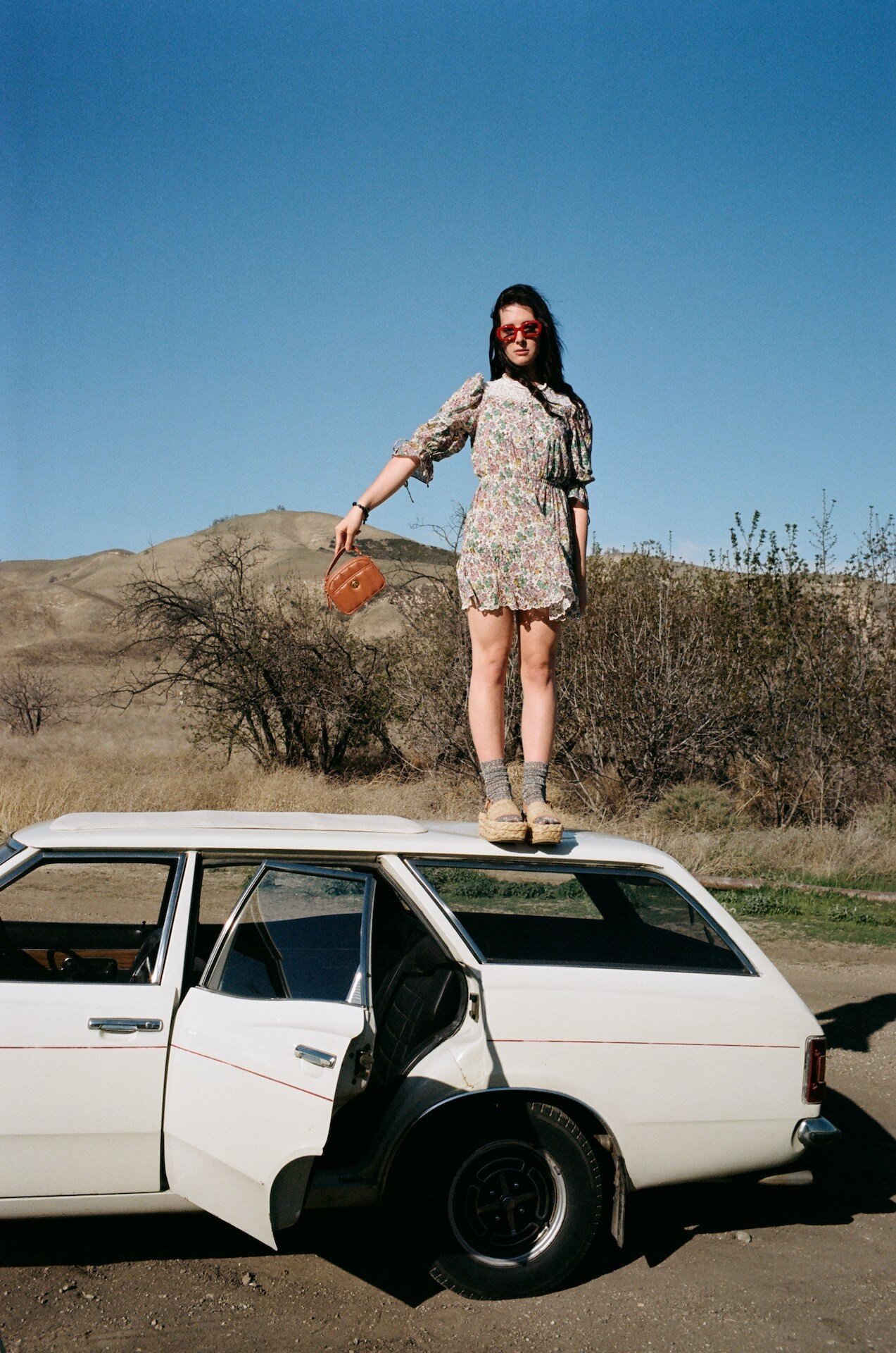 COACH BY MAX FARANGO