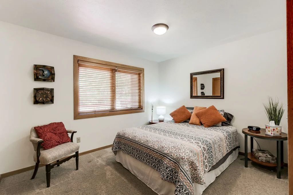 1st Floor Guest Bedroom with Queen Bed Views of the garden and red rocks. Shared bathroom, toilet & shower. $1600 for one person or $875 each for 2 people (all inclusive except travel costs)