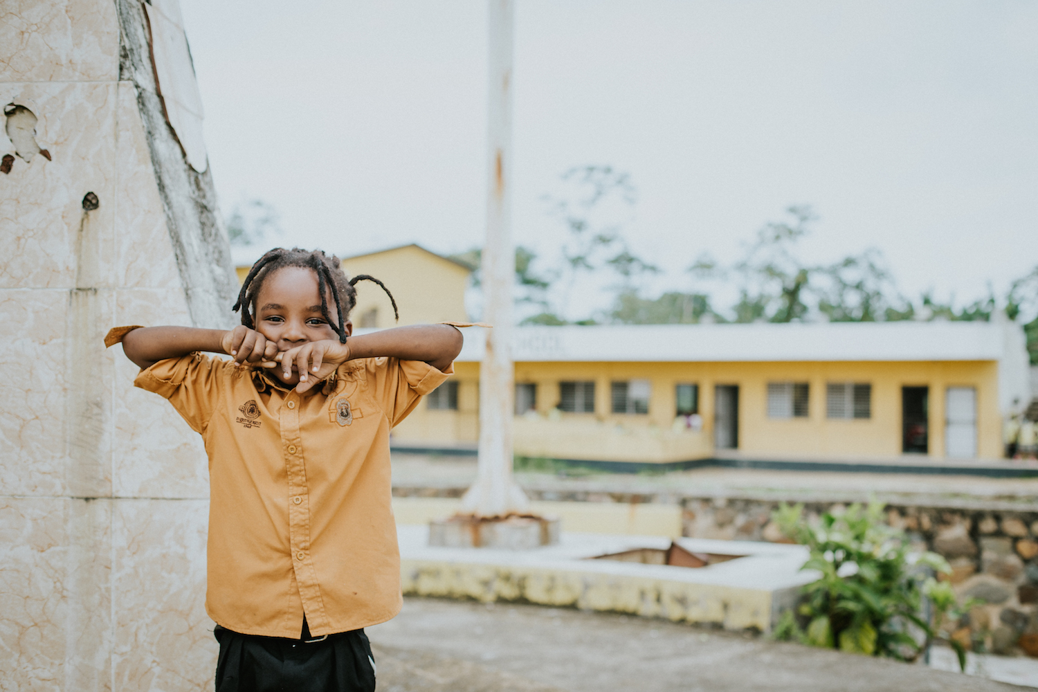 This young boy was shy but still wanted me to take a photo of him so we compromised by letting him cover half of his face.