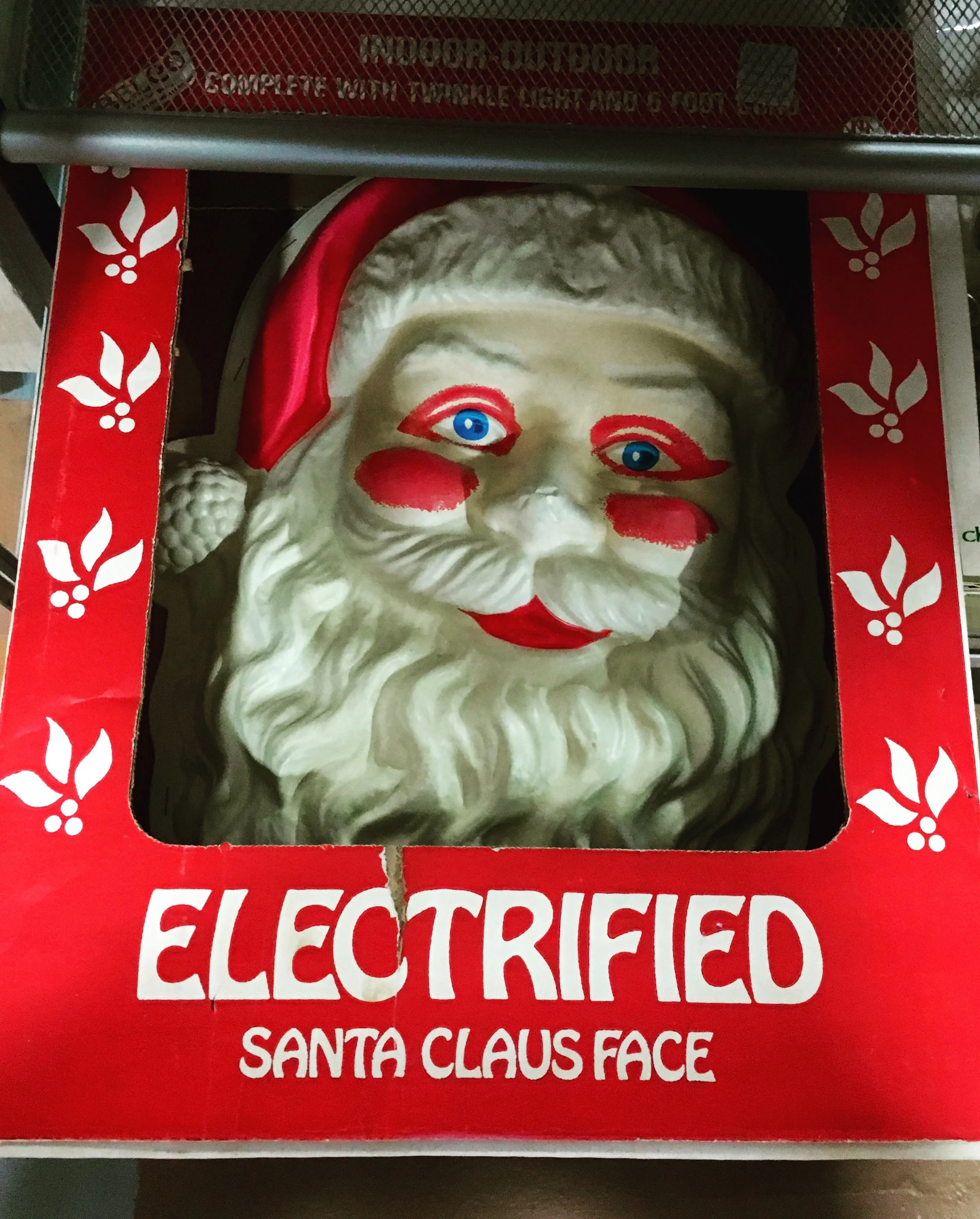  Nothing rings in the holiday cheer like an anemic Santa with blood-red eyeshadow, lipstick and rosacea who's just waiting to electrocute you. 