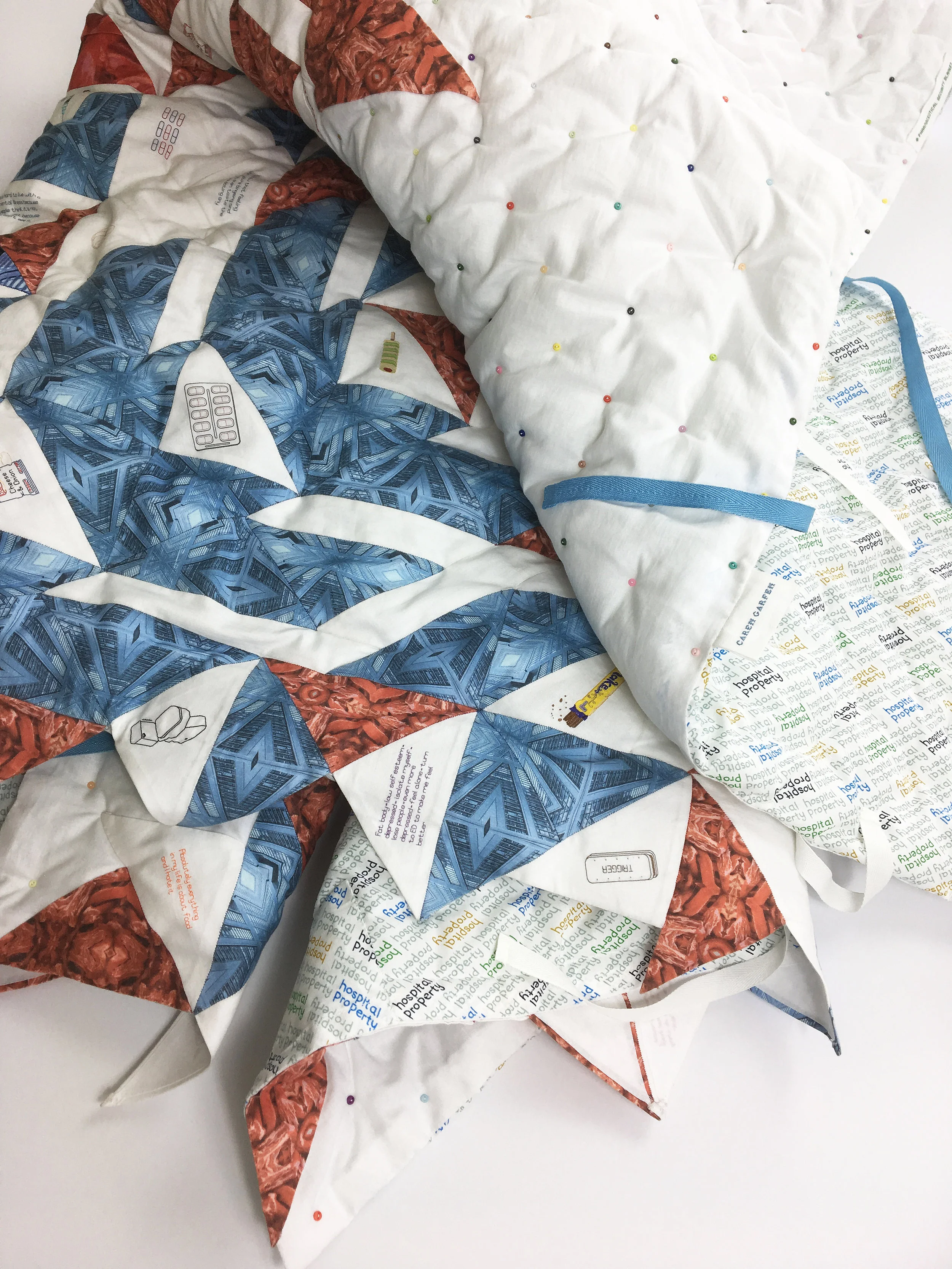 Tiny colourful buttons have been used in the construction of the quilt