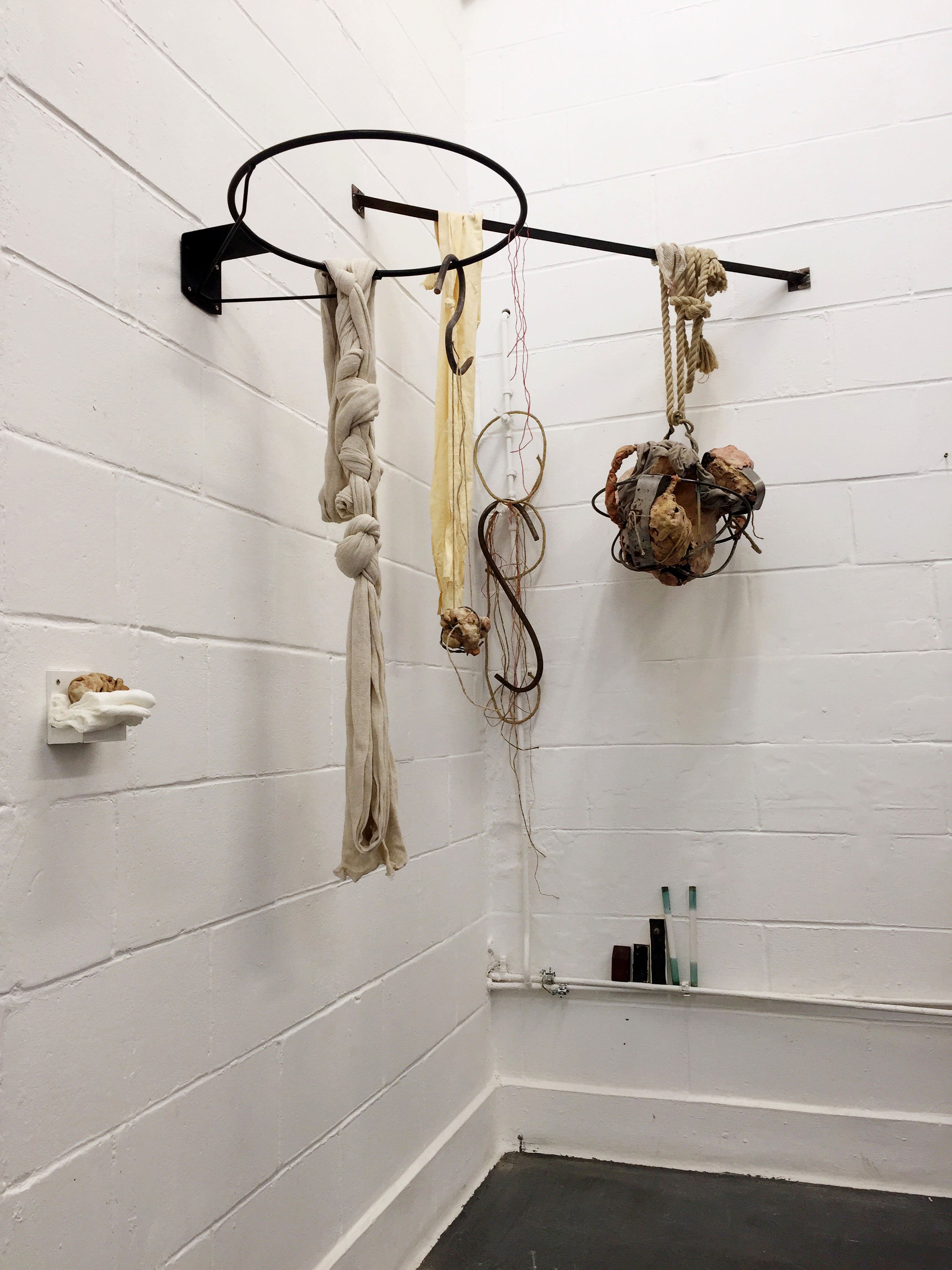   Intestinos,  2018, Installation, air dry clay, wax, steel frame, fabric, rope, chains. Dimensions variable.  