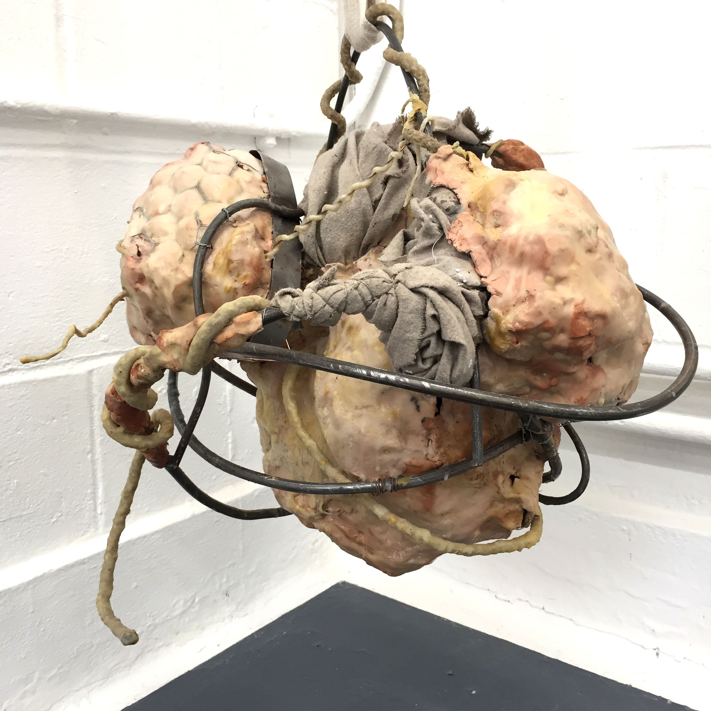  Fully in Bloom,  2018, Steel frame, air dry clay, wax, fabric.  