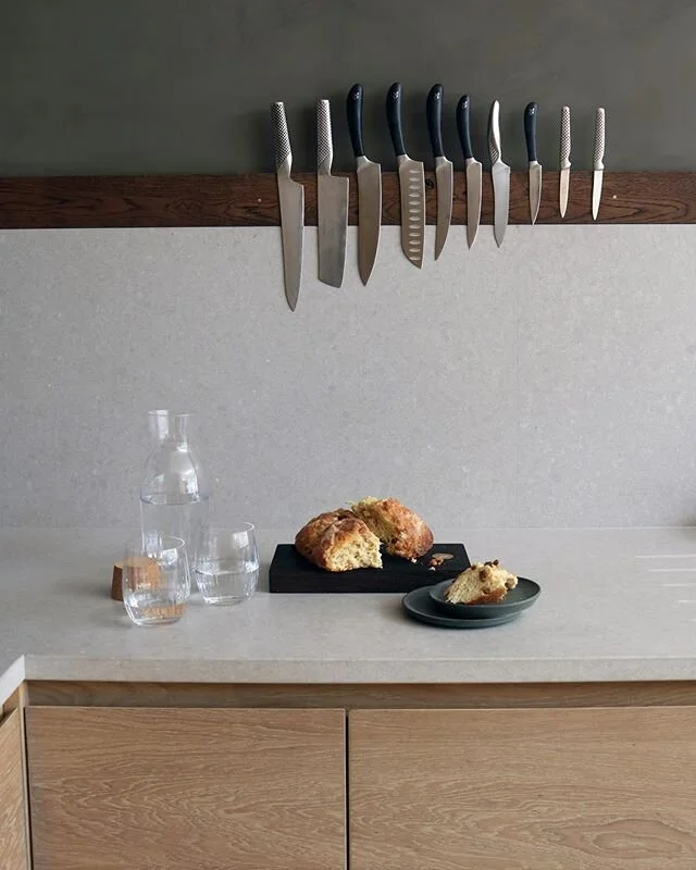 The delicious fruit loaf our client made for us as a snack made the perfect prop for this shot. I positioned it under the sleek integrated magnet knife holder that we built into the up stand. If you look closely you&rsquo;ll see the small brass inlay