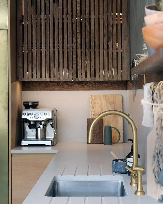 The clients didn&rsquo;t like the idea of open shelving as they felt they would clutter the shelves. Instead we created slated wall cupboards as a nice alternative. I do feel it&rsquo;s nice to have a bit of open shelving though especially for those 
