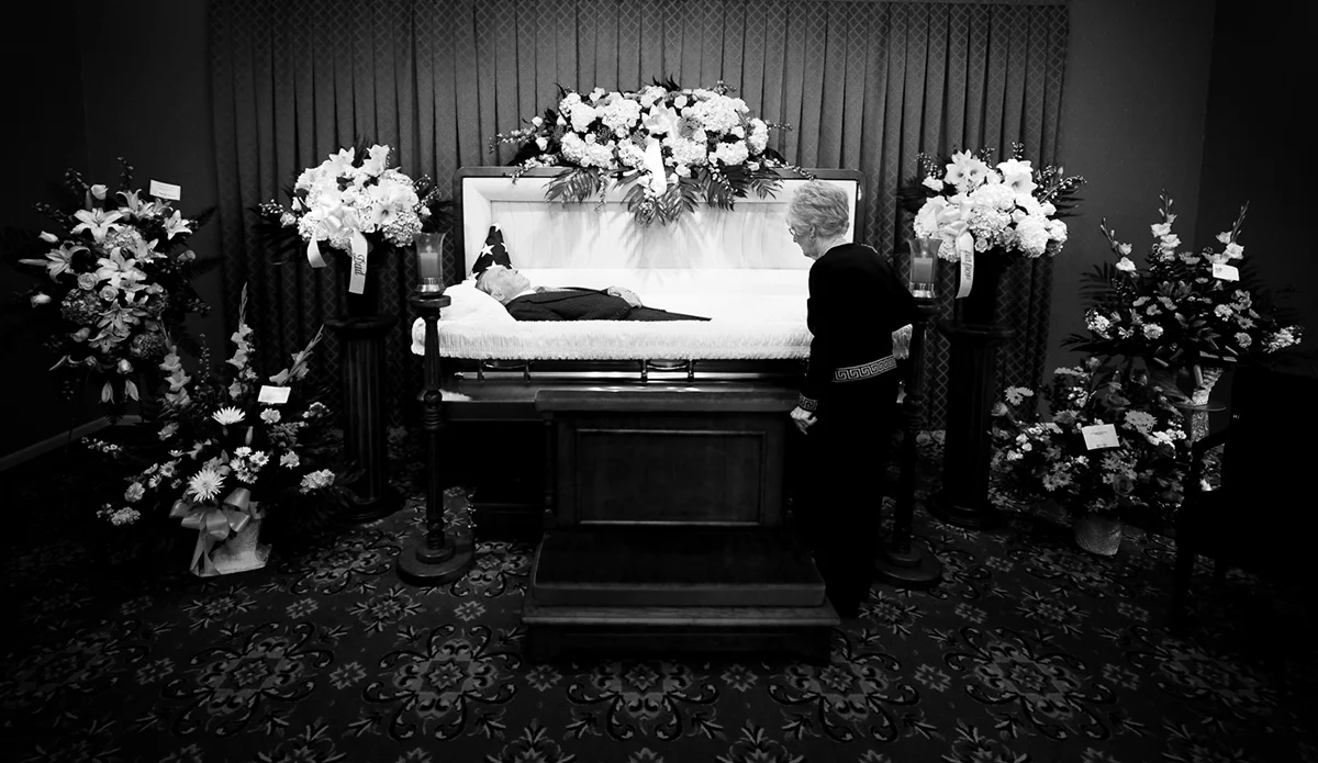 My grandmother, Dolly, saying goodbye to my grandfather and her husband of 56 years.