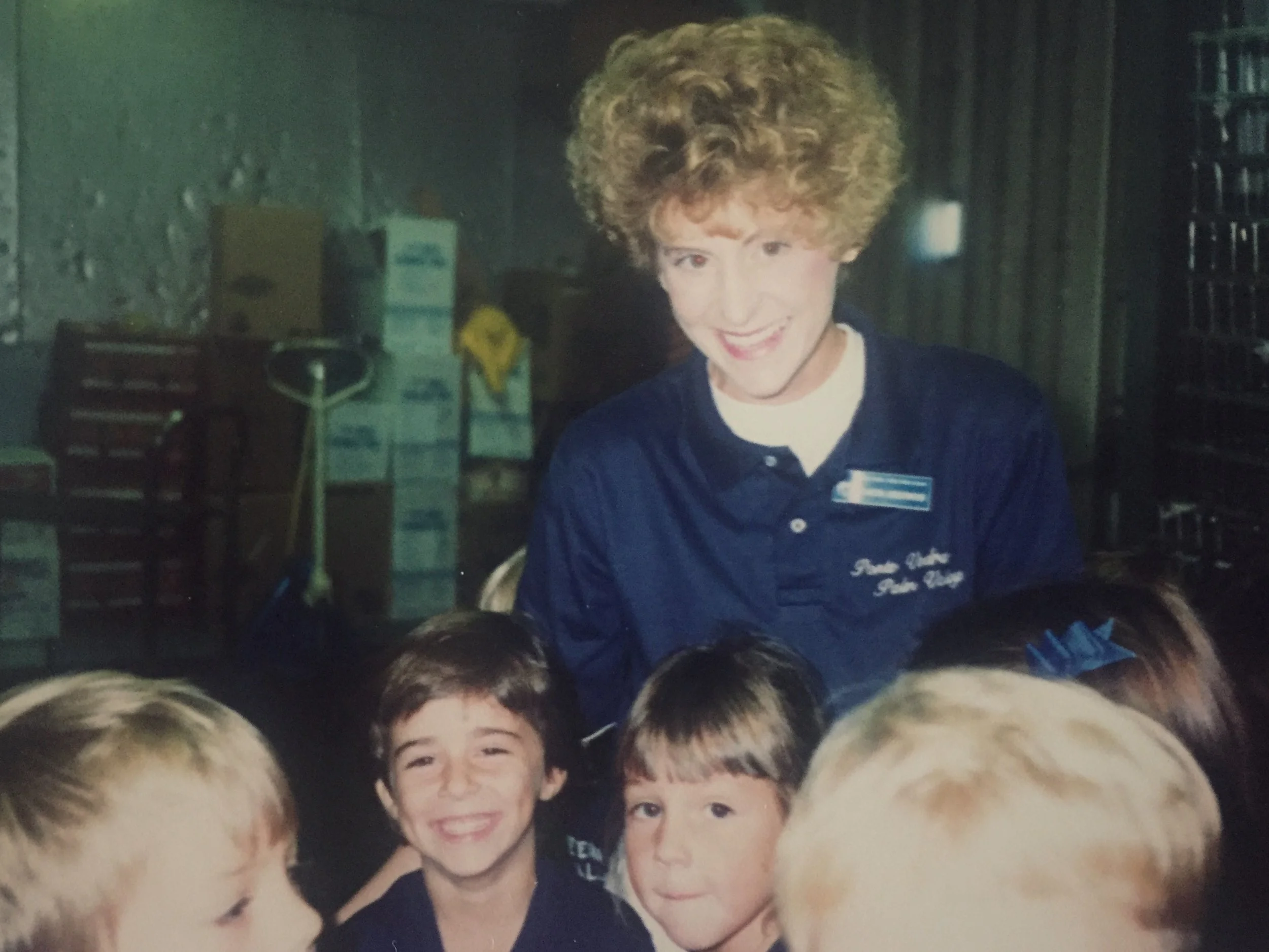 Mrs. Underwood during our field trip to Publix, the local grocery store. I'm the short-haired smiler to her left.