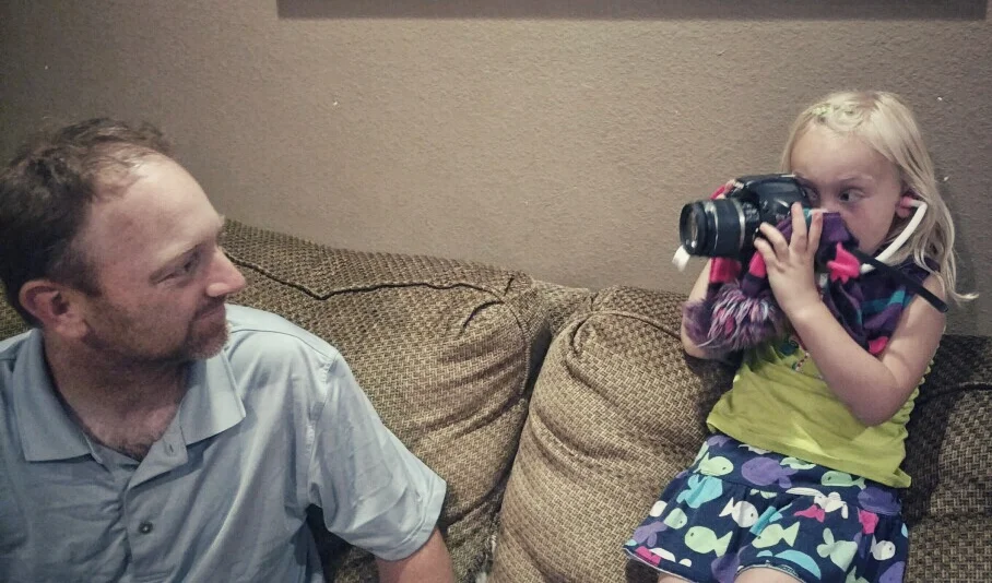 Emorie's mom sent this picture of her "interviewing" her dad, Jarod, with her stethoscope and her mom's DSLR. 
