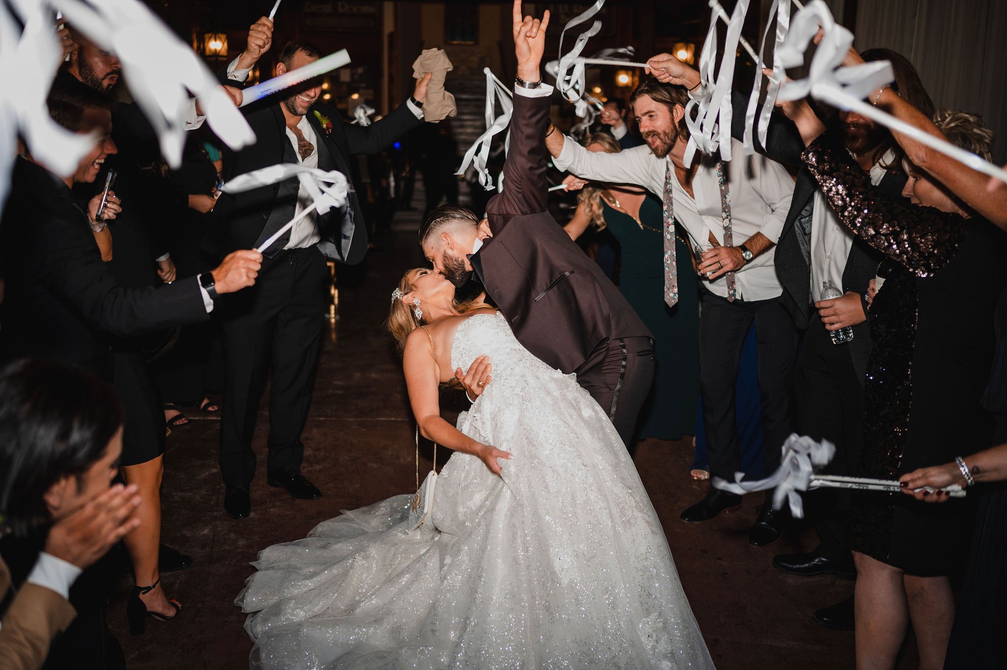 houston-wedding-photographer-grand-exit-kiss.jpg