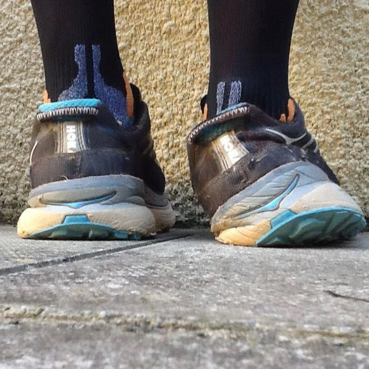 H ere is a great case from a reader.
“Hey guys, I absolutely love the show, especially as it becomes less and less over my head. Due to your love of gait-altering absurdly thick EVA midsoles, I thought you might like to check out this Hoka incident that occurred at the Marathon des Sable across the Sahara in Morocco, a 6 day 251km event. It was posted by Ian Corless at Talk Ultra Podcast. Apparently the medial side of the midsole collapsed–on DAY 2! This guy finished the race, and as you have to carry 100% of your gear and nutrition, I guess he only had the one pair. It looks like this runner should fly out to CO or IL asap, because if he didn’t have gait issues before, he is sure to have them now.”
This brings up some scary thoughts when it comes to the amount of EVA foam and quality of foam (EVA or otherwise) being used in some shoes. "The more foam there exists, the greater one can break down into their compensation or deforming strategy.“ What do we mean by this ? Well, two things should be on one’s mind: 1. all foam breaks down into the vector of the deforming forces and 2. most of us do not have perfectly clean biomechanics, thus an abnormal loading vector is most likely present. These aberrant biomechanics are eventually reflected into our shoes as a "wear pattern”. In this case, the EVA foam had progressively broken down into their rearfoot pronation (and likely mid and forefoot pronation). In this case, even if the person had enough tibialis posterior and other medial pronation-decelerating structure strength at the start, the acceleration of their foot into this issue is now even more abrupt, brisk, excessive etc. A new pair of shoes would not be broken down into this deformity and so a newer pair of shoes is preventive. This is why we recommend new shoes often, and the cycling in of another pair (or several pair) into the mix so that one is never driving the same shoes into the potentially destructive compensation patterns that most of us have. At least with a fresh pair of shoes brought into the mix at the 200 mile wear point, you would only be in the more destructive shoes every other run, giving the body time to recuperate more.
As for this pair of shoes, this runner either has a terrible right foot problem or this was a brutally flawed right shoe from the get go, or both. We can only imaging how painful the medial knee might be at this point. Furthermore, imagine the abrupt nature of the hip internal rotation mechanics ! IF they do not have hip labrum impingement yet, they will soon ! And with that amount of internal limb spin, can you imagine how inhibited the glutes would be from constantly having to eccentrically control that excessive rotation?
As a whole, are not huge fans of the HOKA shoe family, we just cannot fathom the need for this much foam under the feet. If you have been with us long enough you will have heard on our podcast and blog talk about increased impact forces with increasing EVA foam thickness ( want that info, here is the link and references ). Just because some EVA foam is good, doesn’t mean more is better. Remember, to propulse off of a foam infrastructure you must bottom out/compress the foam sufficiently to find a firmness to propulse from. The Hoka’s have plenty of foam making this our concern, and we are not picking on just them. There are other companies doing this “super sizing/super stacking” such as Brooks, Altra, and New Balance to name just a few. Sure they have added a greater forefoot rocker/toe spring on the front of the shoe to help (they have to because the foam thickness is so great that there is no flexing of the forefoot of the shoes), but is it enough for you? Remember, every biomechanical phase of the gait cycle is necessary and timely to engage the natural joint, ligament, muscle components of joint loading, mobility, stability and movement. If you spend too much time in one phase (perhaps because you are waiting for foam to decompress) you may wait a moment too long and miss the opportunity for another critical phase to begin in the sequence. This is the root cause of many injuries, aberrant biomechanics leading to aberrant mobility or stability.
So remember these few things:
1. more is not always better for you, it may be for some, but maybe not you.
2. there is a price to pay somewhere in the mechanical system, after all the body is a contained system. What doesn’t happen at one joint often has to be made up at the next proximal or distal joint.
3. Everyone has some aberrant mechanics. No one is perfect. These imperfections will reflect in your shoes, and the longer you are in a pair of shoes the deeper the aberrant mechanics will be reflected in your shoe, thus acting as a steering wheel for the aberrant pattern (the steering is more direct/ more aggressive than in a new pair of shoes). So keep at least 2 pair of shoes rotating in your run cycle, one newer and one half done. We even recommend 3 pairs often. Trust us, the sudden biomechanical shift from a dead shoe into a new one (even though it is a clean new shoe without bad patterns in it) is still a biomechanical shift and could cause adaptive phase problems, pain or injury.
Lots to consider in this game. It is not just about dropping into barefoot and taking off down your street. Not if you want to be doing this for a long time and stay healthy.
Shawn and Ivo, the gait guys
* next day follow up from our social media pages:
Along the lines of EVA and yesterdays post: “Wear of the EVA consistently increased heel pad stresses, and reduced EVA thickness was the most influential factor, e.g., for a 50% reduction in thickness, peak heel pad stress increased by 19%. ” This study looks at a model; it would be interesting to see this study with a large cohort.
Biomed Mater Eng. 2006;16(5):289-99.
Role of EVA viscoelastic properties in the protective performance of a sport shoe: computational studies.
Even-Tzur N 1 , Weisz E , Hirsch-Falk Y , Gefen A .
http://www.ncbi.nlm.nih.gov/pubmed/17075164