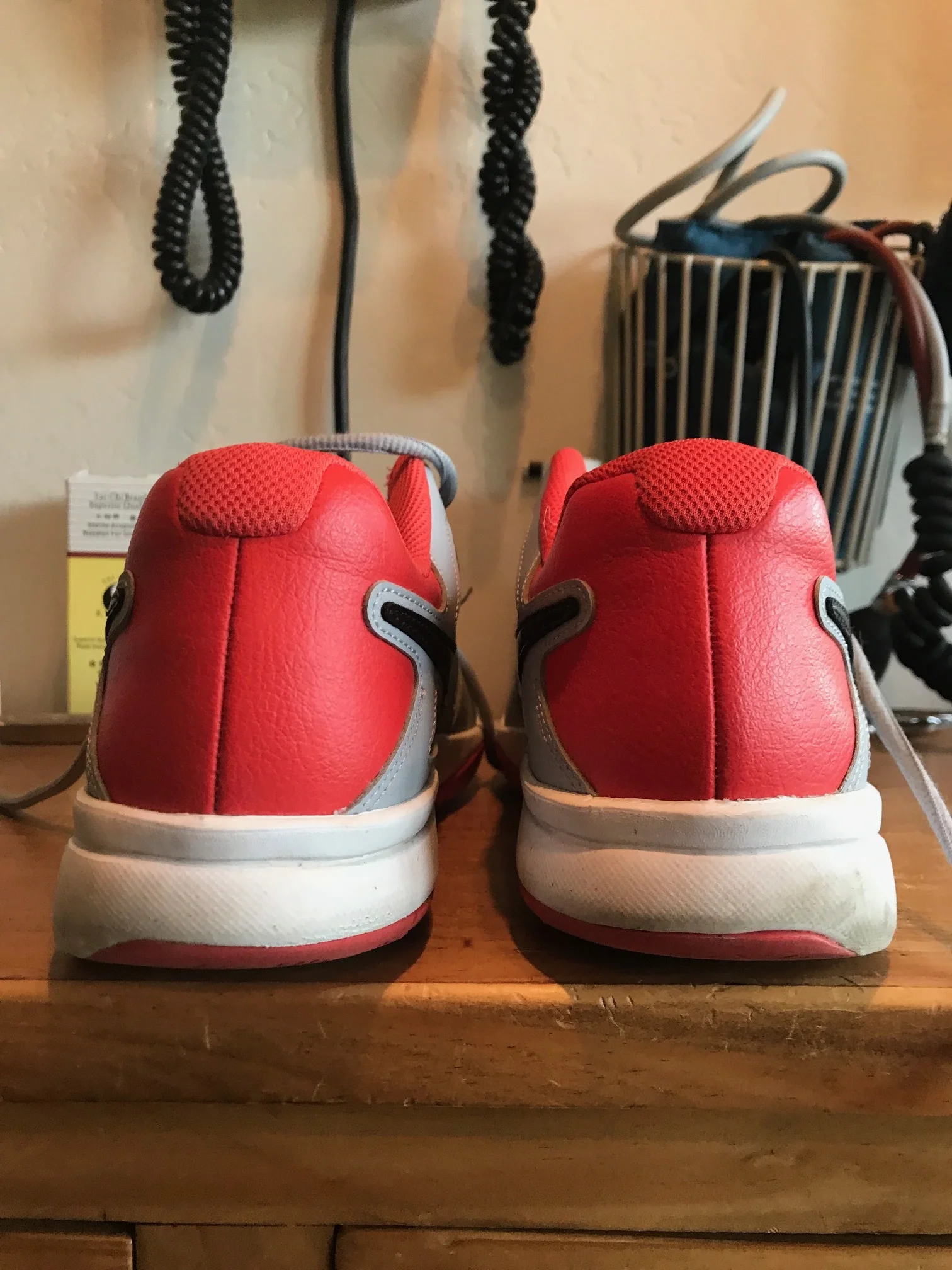 line up the center of the heel counters with the outsoles, and what do you see?