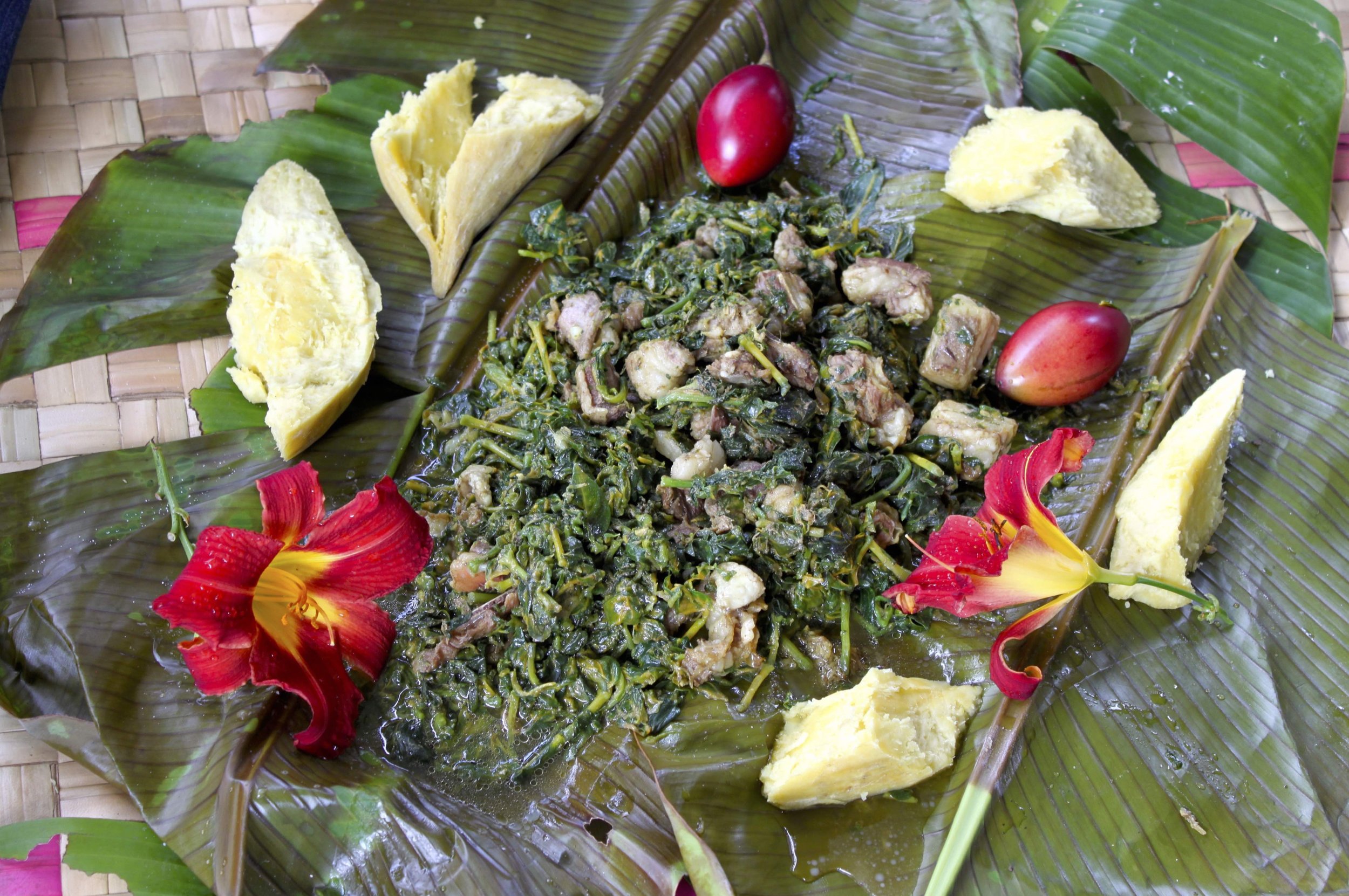 Bamboo cooking dish with lamb and kembempa fern greens from Tanna island, Vanuatu