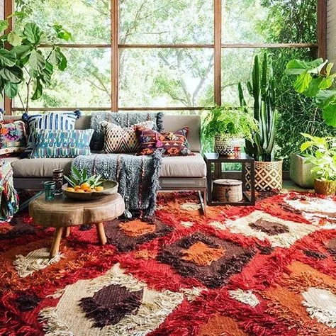 A textured, colourful rug adds depth to a room... don't be afraid to clash. Image: Pinterest