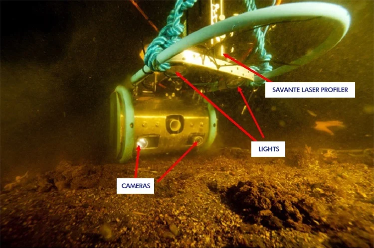 Diver camera captures laser-equipped seabed sled before passing over sample of Sabellaria worm reef (foreground). Image courtesy of SAMS.