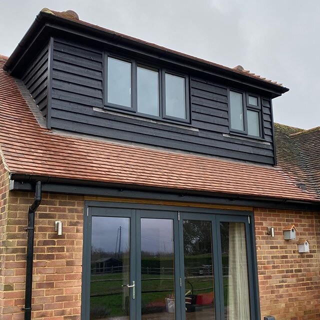 We recently completed this little dormer extension. We think black feather edge cladding is a good choice and when the house is clad the same it will look like a new house. #extension #builder #design #and #build
