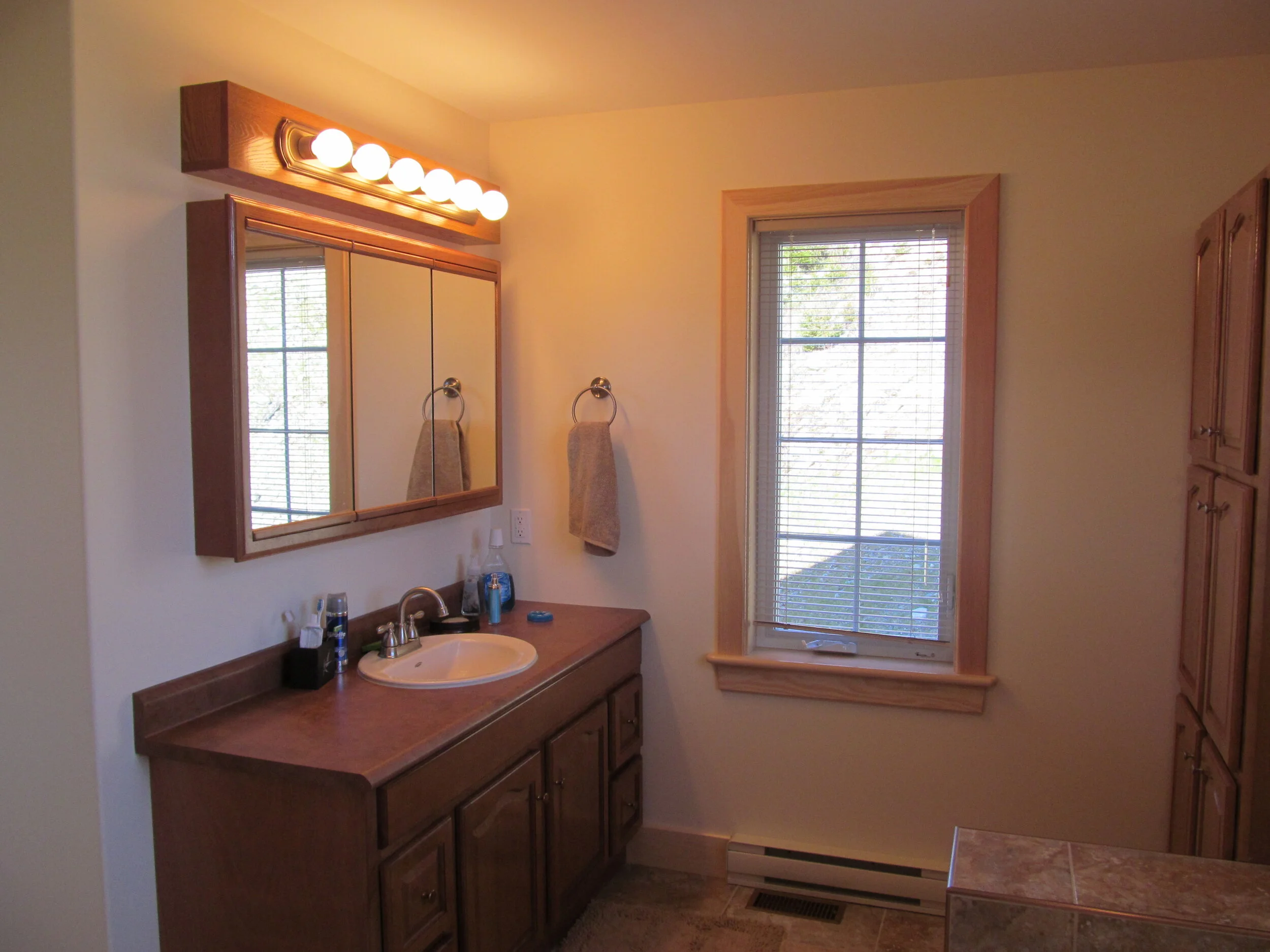 master bath vanity with double  linen cabinet .JPG