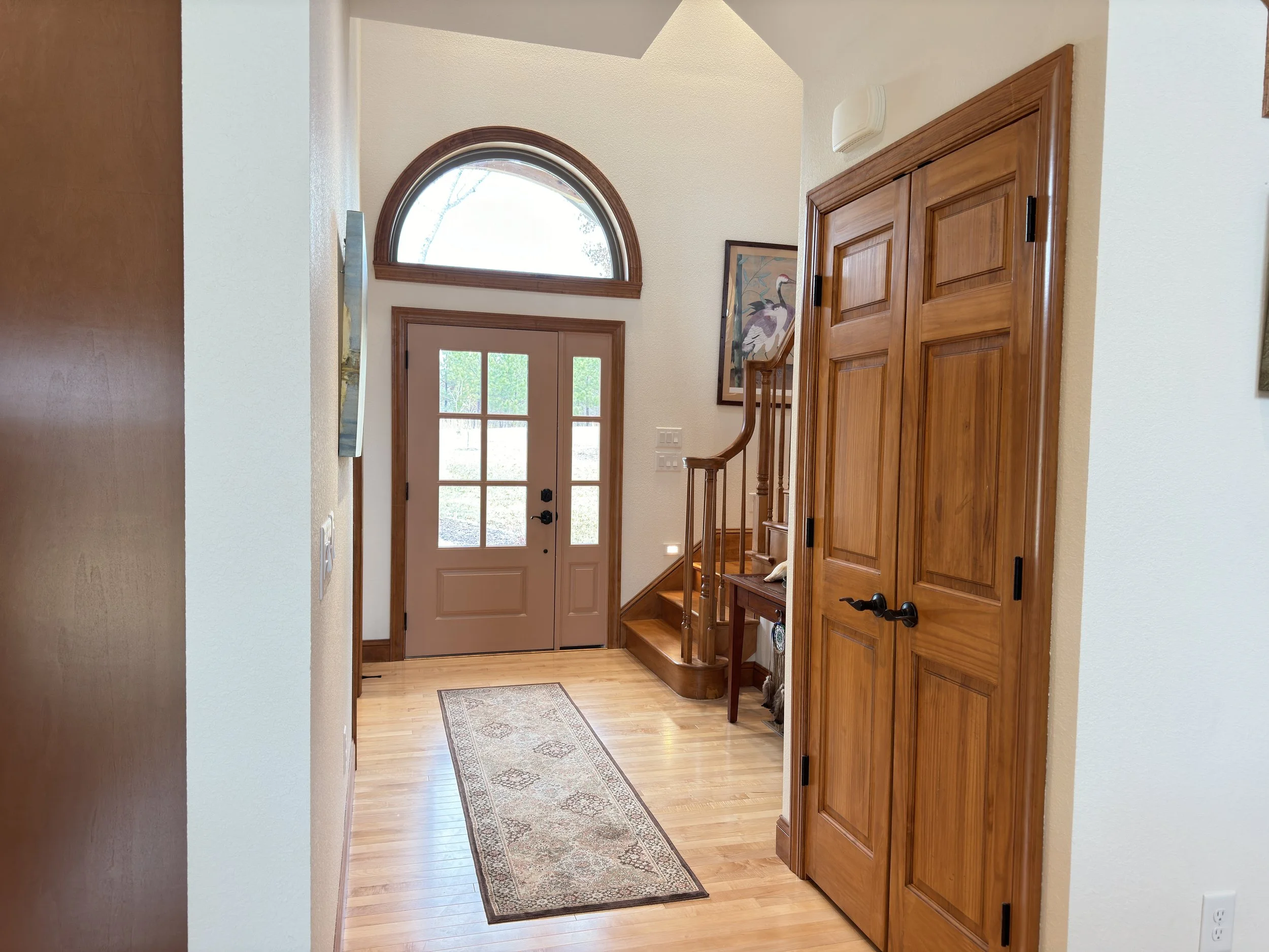 entry way with closet and stairs.JPG