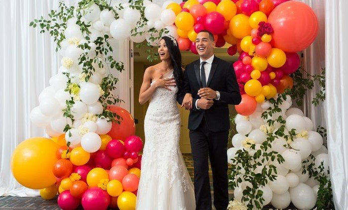 peach and orange wedding balloon arch.jpeg