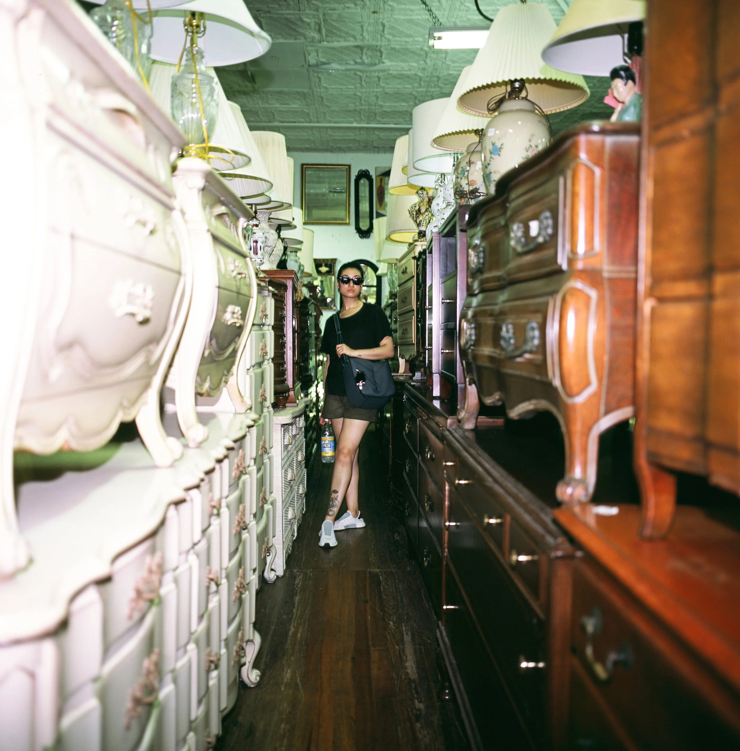  experimenting with flash in creepy rows of dressers - somehow this was 1/2sec and not blurred to oblivion! Sorry Cece for not knowing 100% how to use my camera 