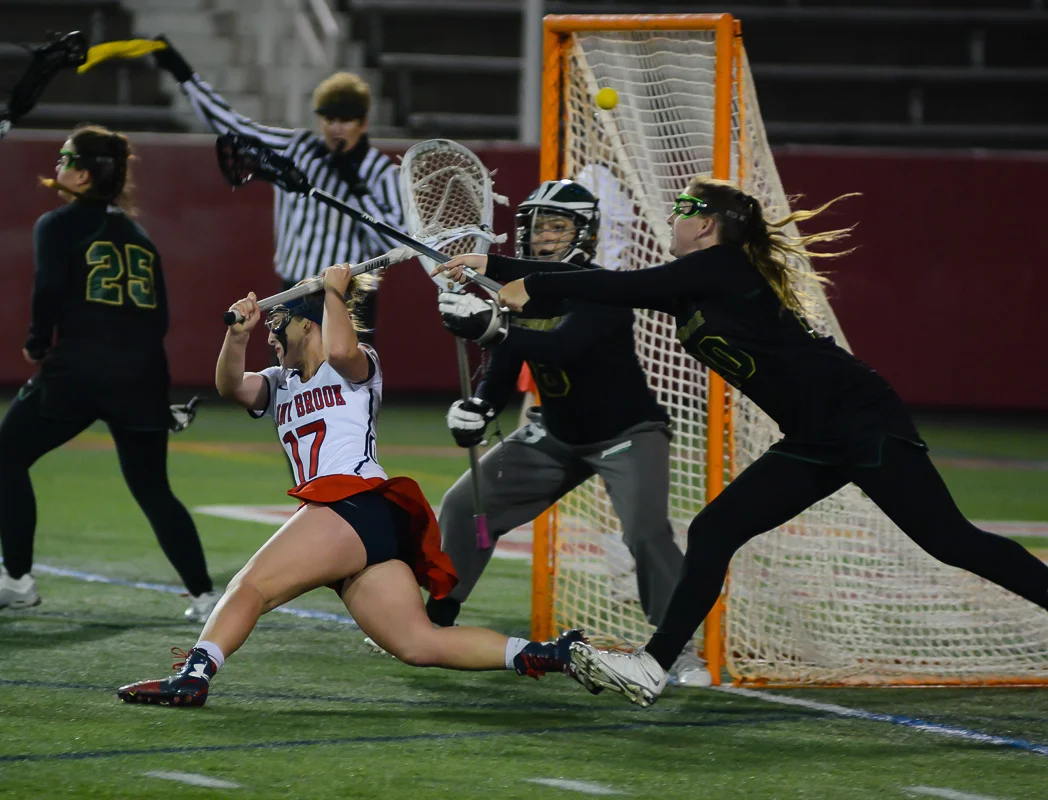 Stony Brook Universities Kylie Ohlmiller scores a behind the back goal in the second half of the Seawolves 16-6 win over the Jacksonville Dolphins on March 25, 2016.