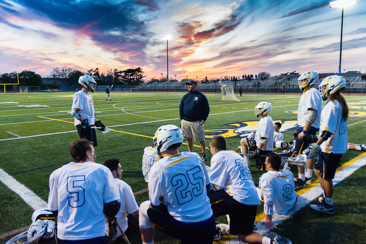 The West Babylon Varsity Lacrosse team relaxes during halftime of their 2016 senior game on May 12, 2016. The Eagles would route Deer Park and secure themselves a slot in the Boys Lacrosse Playoffs. 