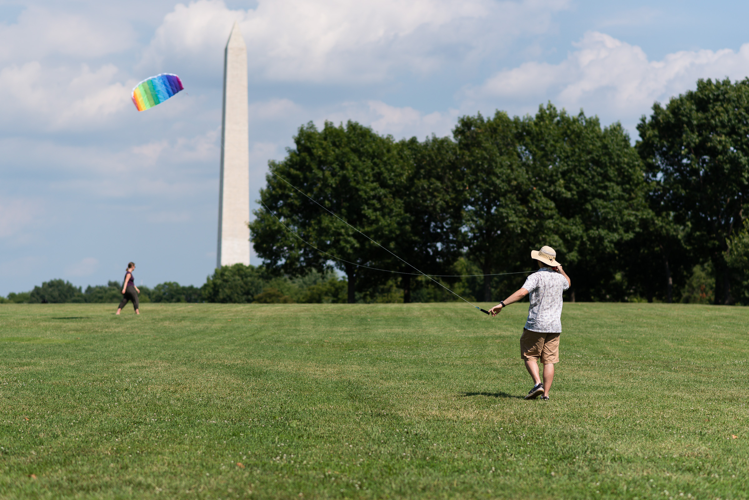 A man flies a kite on the National Mall on July 29, 2016.