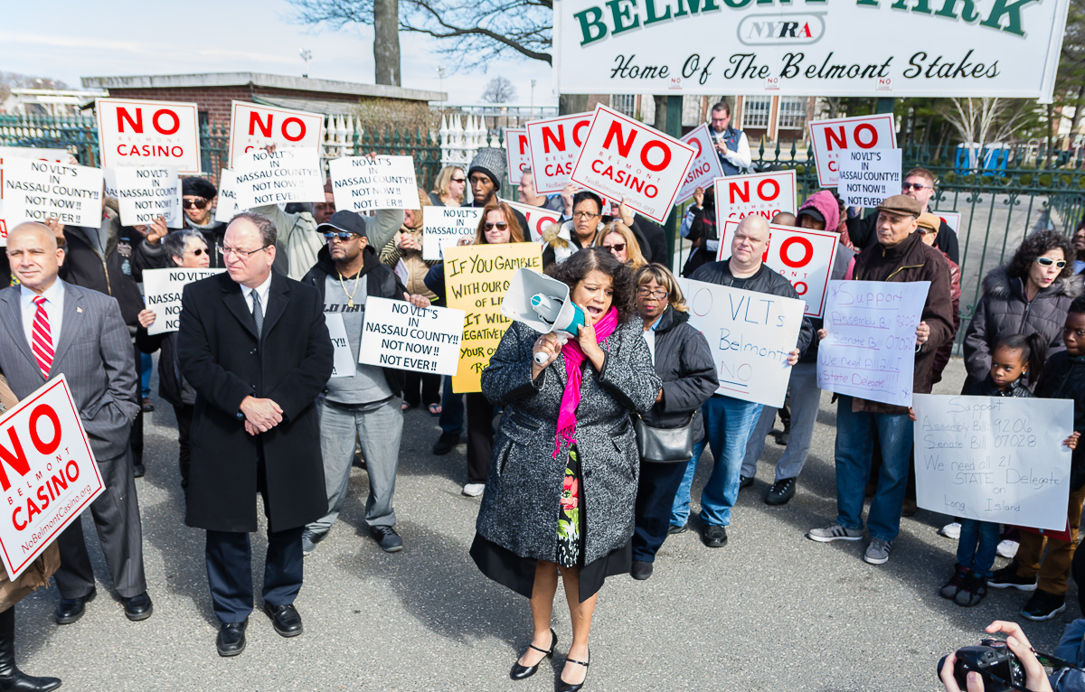 New York State Assemblywoman Kimberly Jean-Pierre leads casino protesters in chants of "Hell no, no casino," on March 26, 2016.