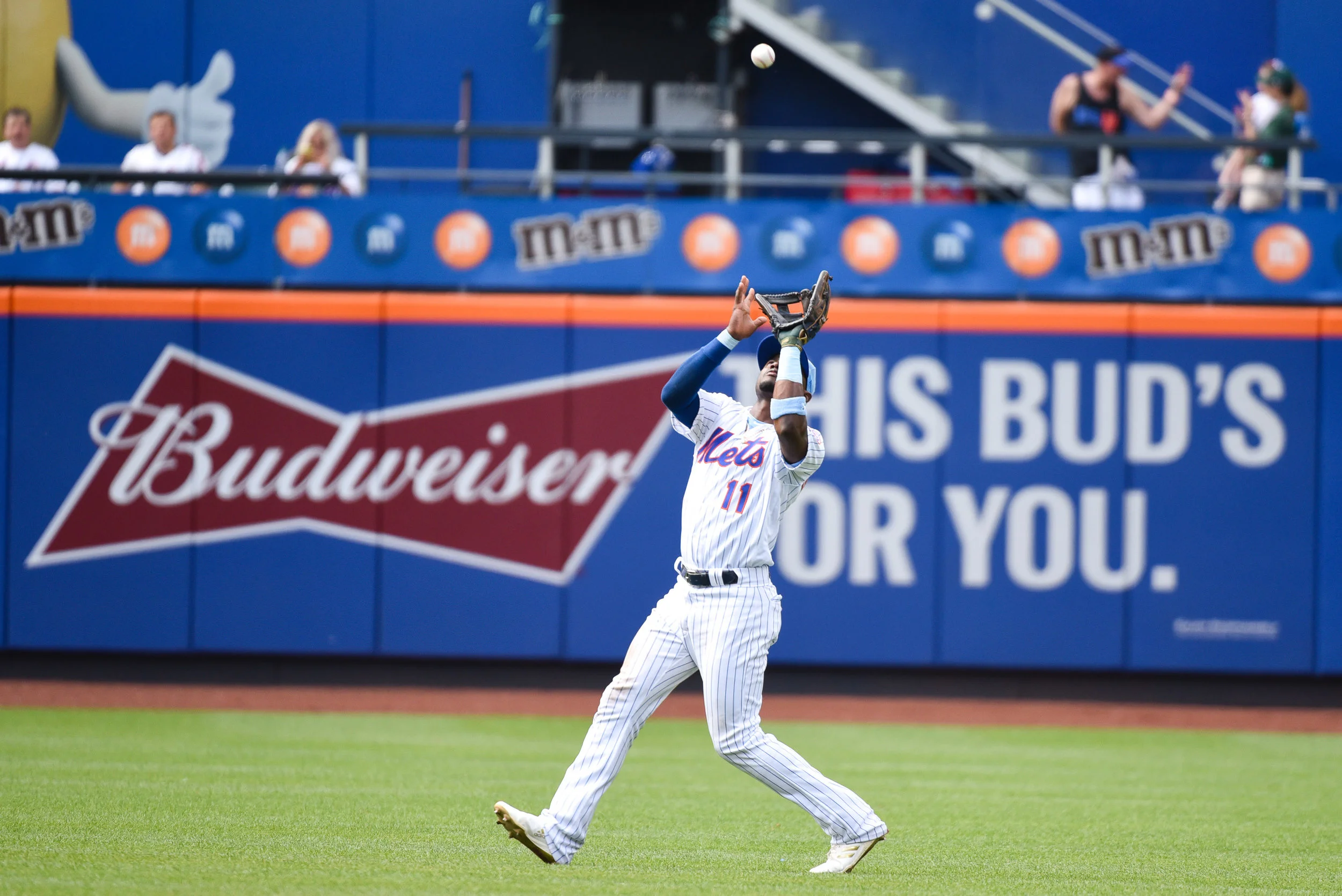 Mets shortstop Adeiny Hechavarria catchers a pop fly in the Mets fall to the Saint Louis Cardinals 4-3 on June 16, 2019.
