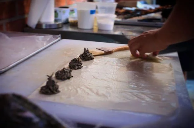 TBT to our first PopCultivate dinner where we made hundreds of Spanokopitas and mixed up the infused and non-infused. 2 years went by quickly!