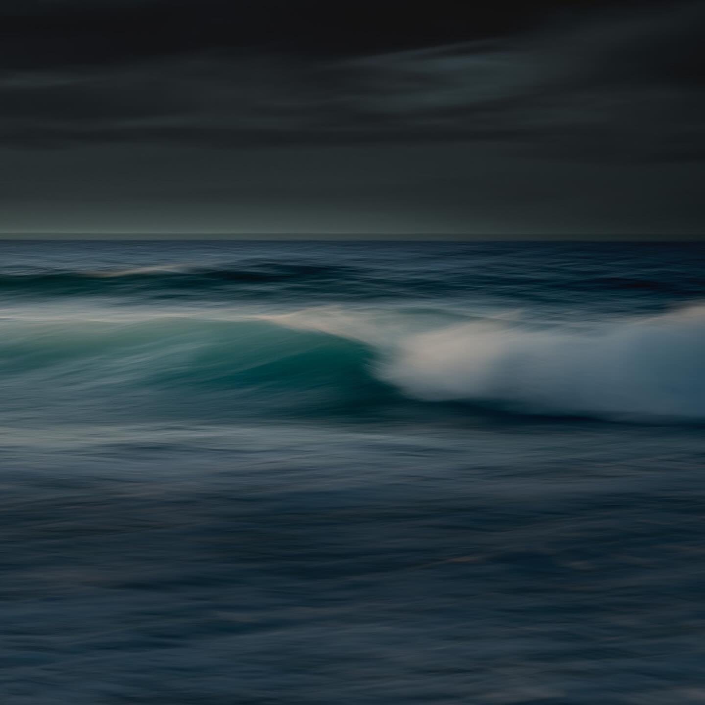 Sometimes a wave, all brooding and blue/grey will rise out of the sea to rage against the shore - nature&rsquo;s poetic manifestation of mood, mystery, energy and timelessness.

#wave #stormclouds #surfphotography #surf #stormsurf #moody #dark #drama