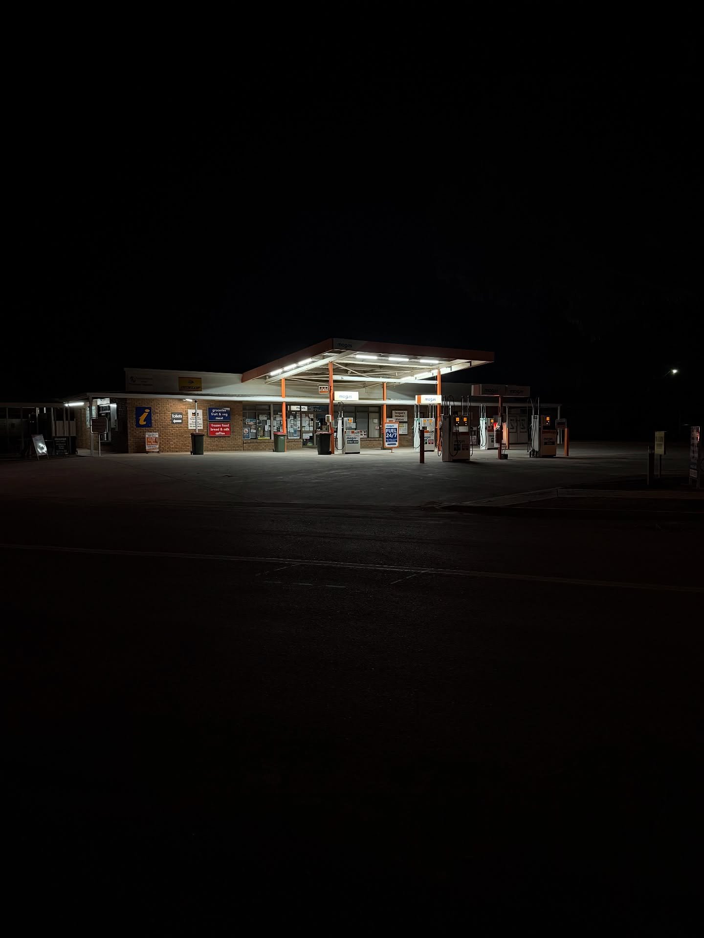 Service Station, Hawker, South Australia. 

#hawker #fuelstop #southaustralia #flindersranges #traveller #nightphotography #iphone16pro #iphonephotography