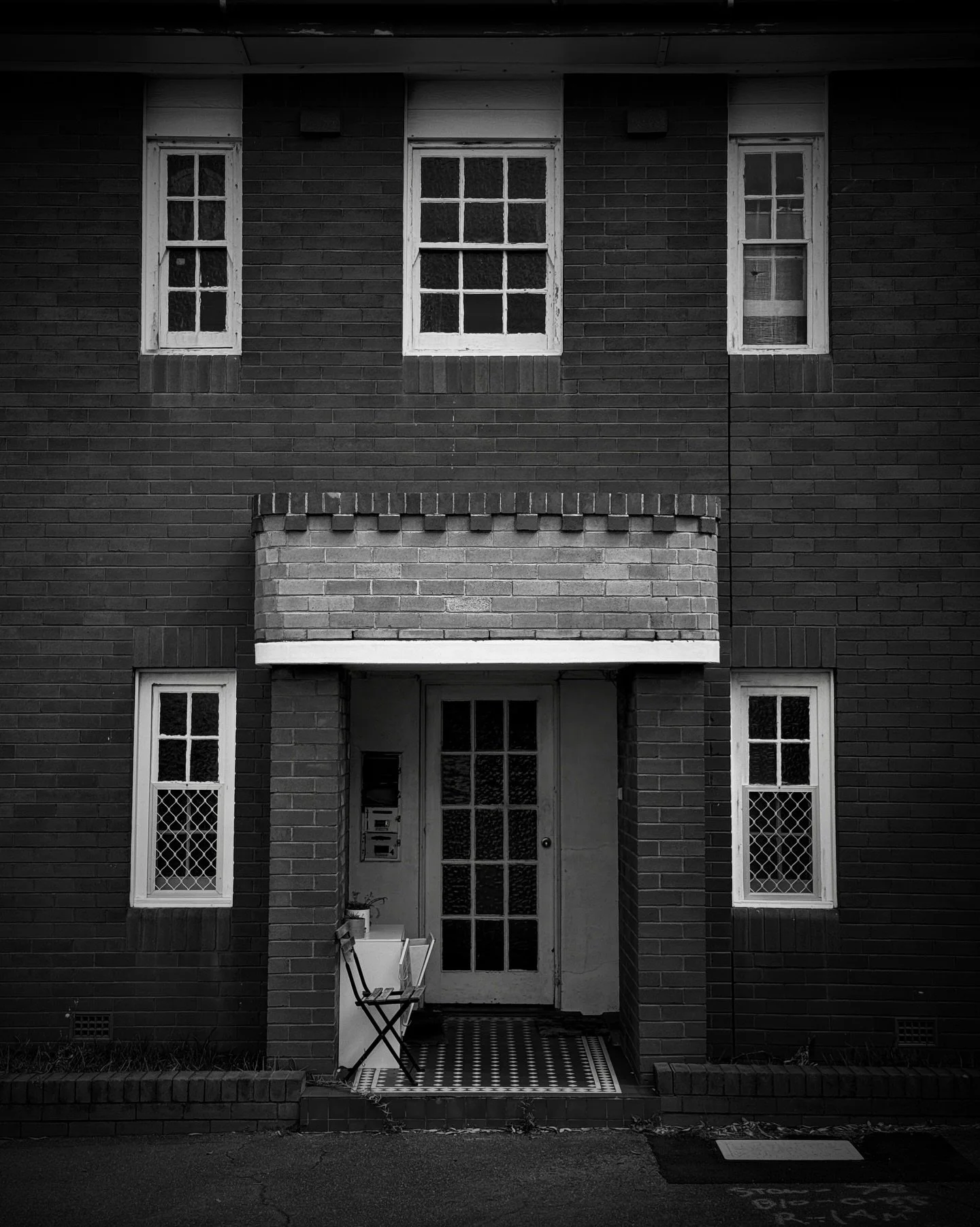 In the neighbourhood - Bar Beach, Australia. 
#shotoniphone #blackandwhitephotography #architecturephotography #windows #doorway
