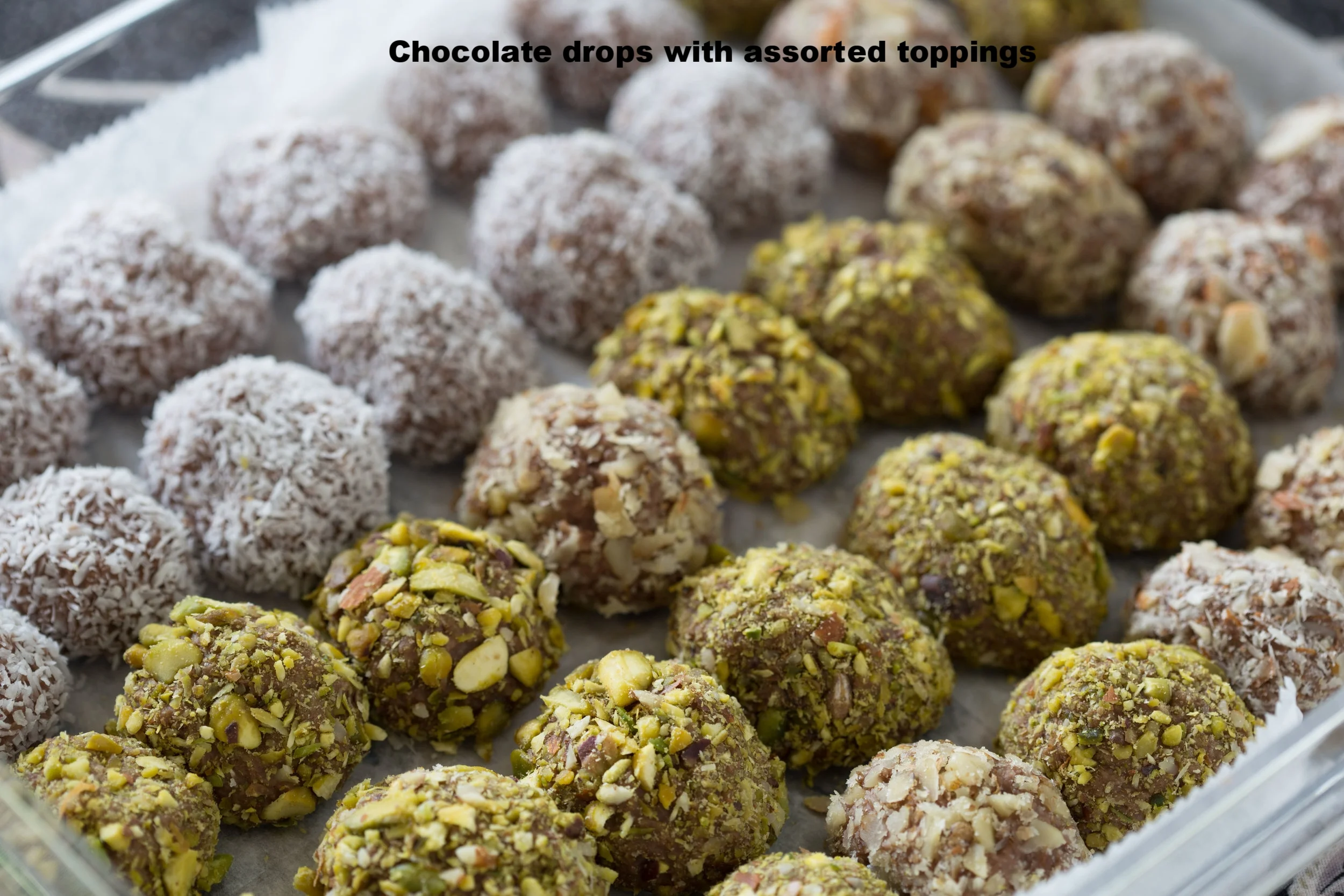 Chocolate drops with assorted toppings