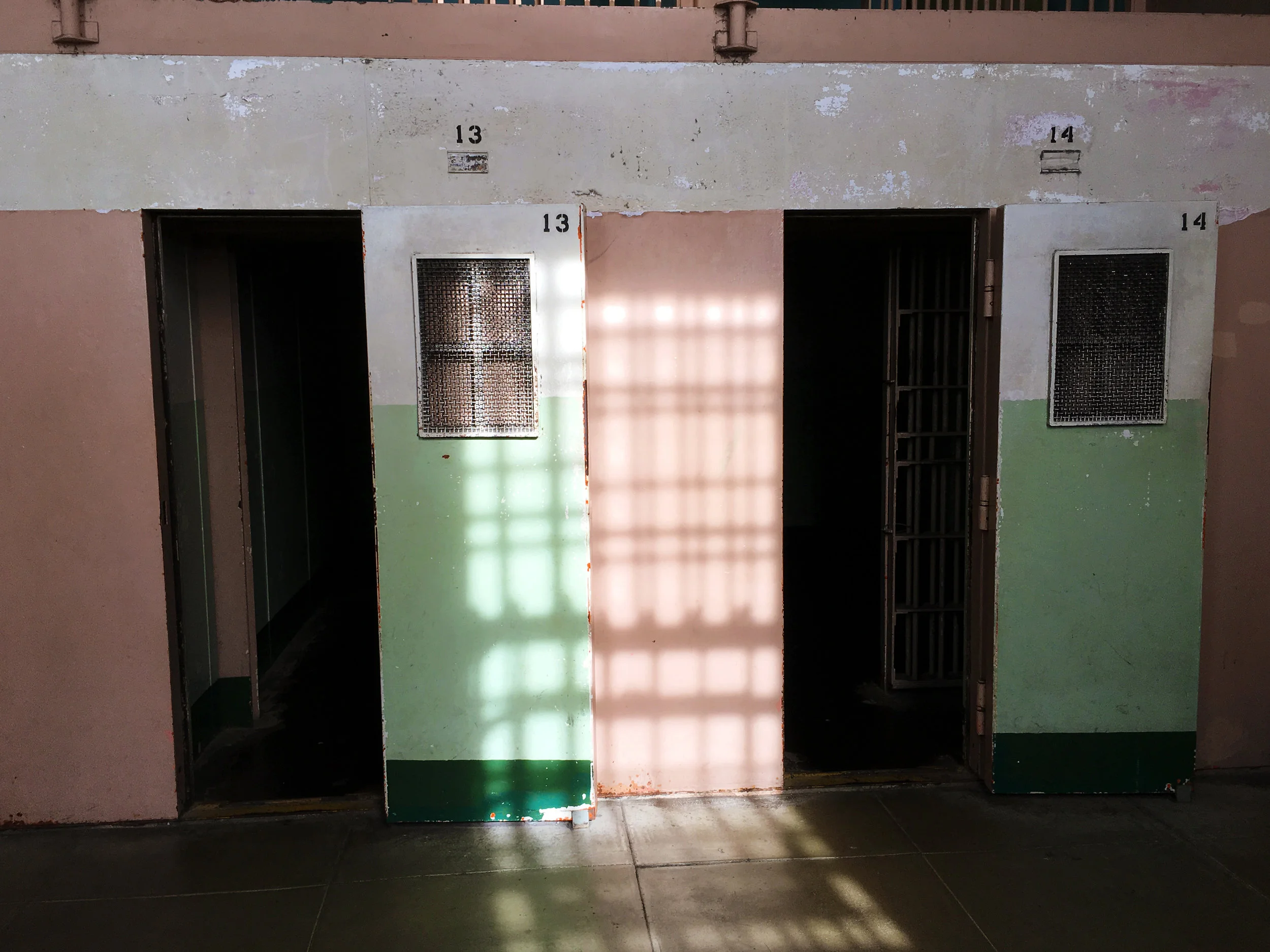 Alcatraz solitary confinement cells. Getting this photo with no people in it took about 5 minutes of patiently standing and waiting. There is definitely someone just off the edge of frame that is about to walk in.