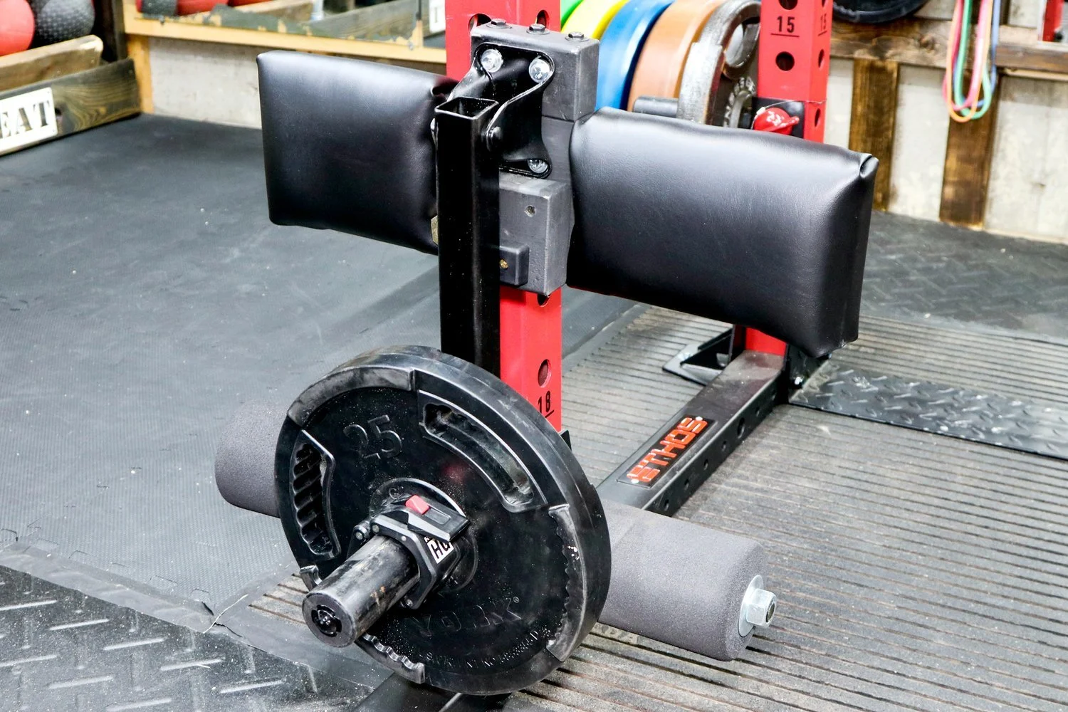 Rack mounted leg curl / extension