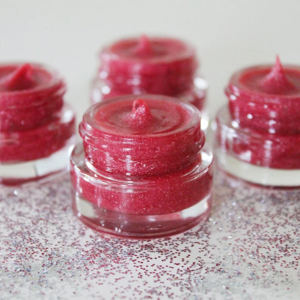 SMOKIN' HOT LIPS $10.00 A little spicy + a little sweet…a little naughty + a lot nice! Smokin’ Hot Lips is a beautiful, lightly tinted and high shining lip gloss that will moisturize and beautify your lips! Lip gloss doesn’t get cleaner than this. Just because we like things pure and natural, doesn’t mean we don’t want a little shimmer and glimmer! Who’s with me?