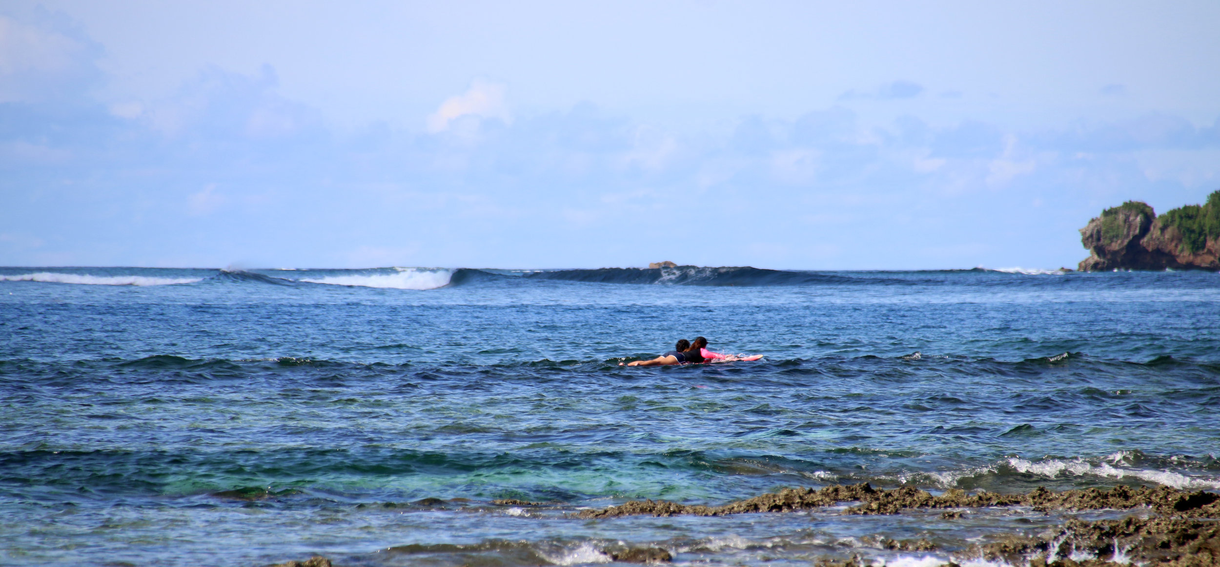 See the big waves behind us? There were surfers playing at that spot which name I forgot. It was amazing to see them ride those really big waves. I could have watched them the whole day! Photo by Alex Lopez.
