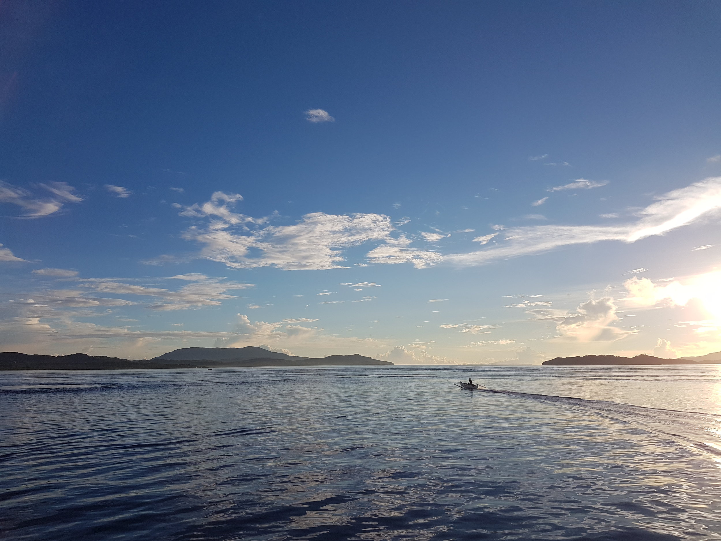 On calmer days, fishermen can be seen throwing their nets and speeding around slower-moving marine vessels very early in the morning.