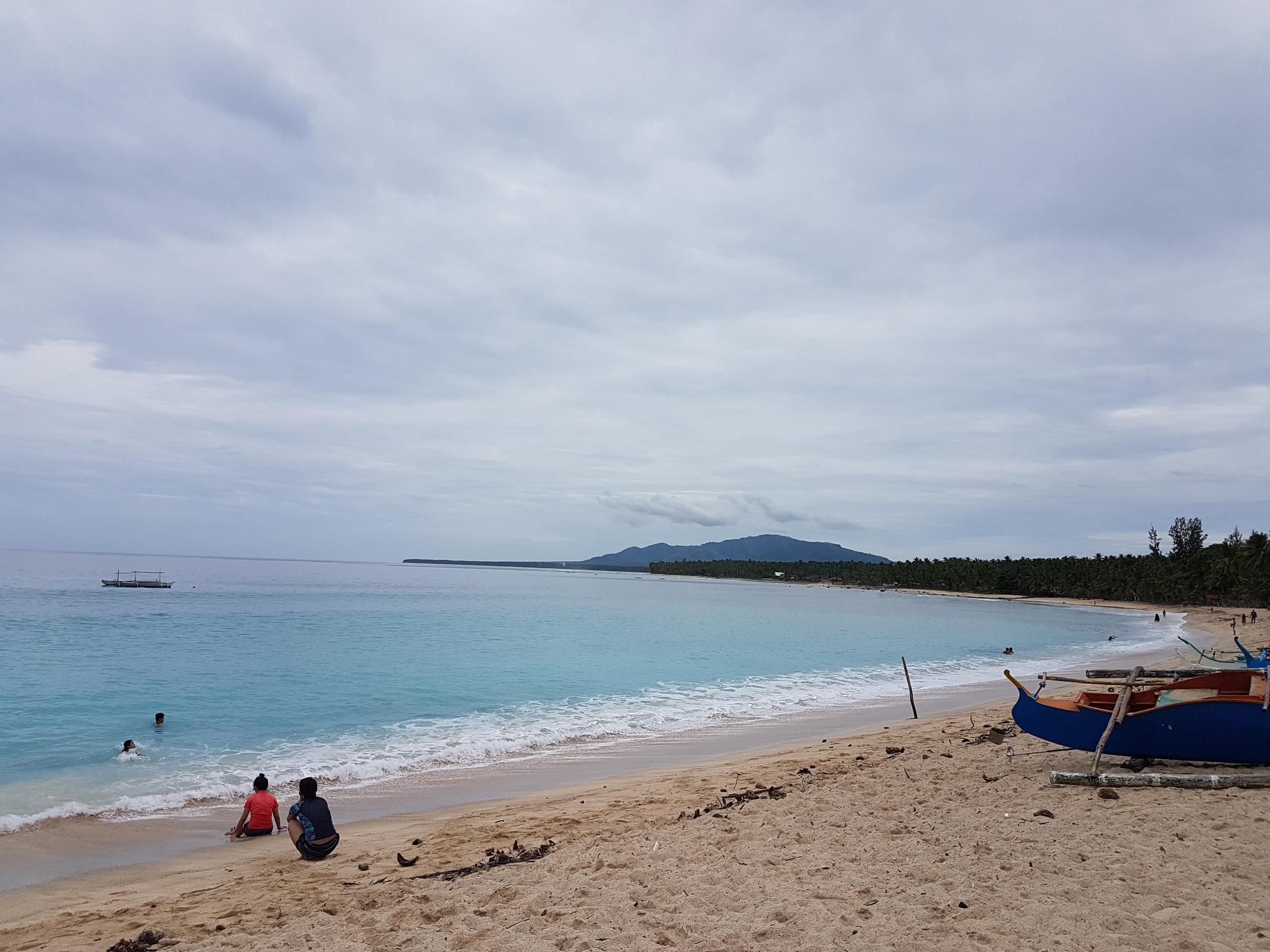 Dahican’s shore still has its own captivating beauty even on a gloomy day.