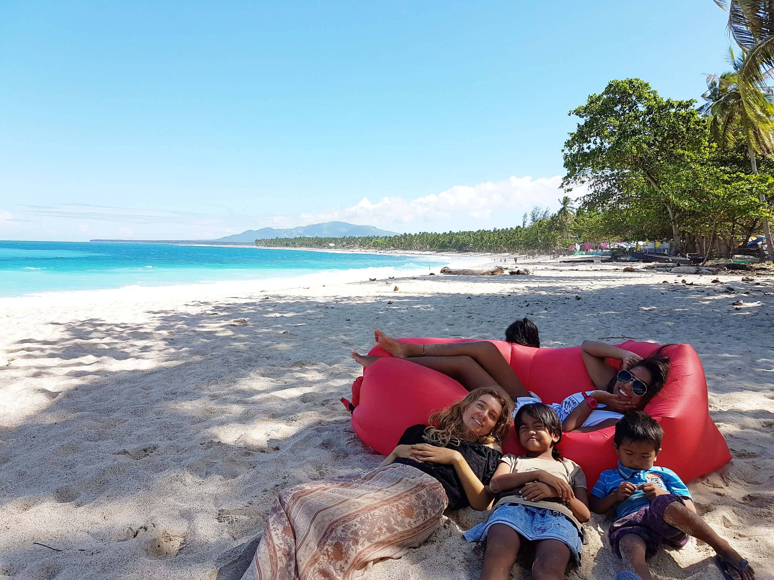 During the day, the sandy space in front of DSR is a perfect place to lie down and watch people surfing in the distant beach break.