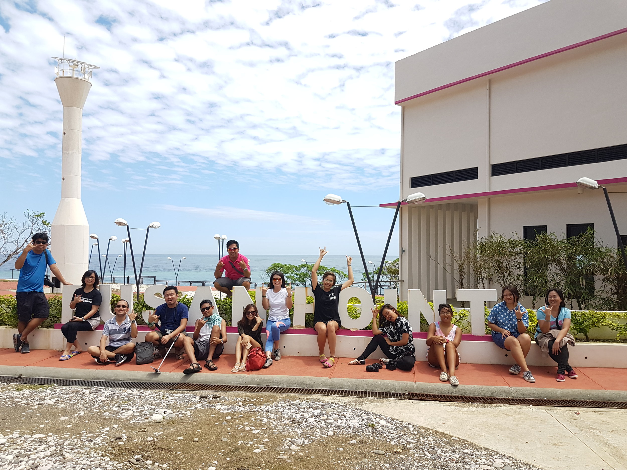 The VDFS team and media at the entrance of Pusan Point.