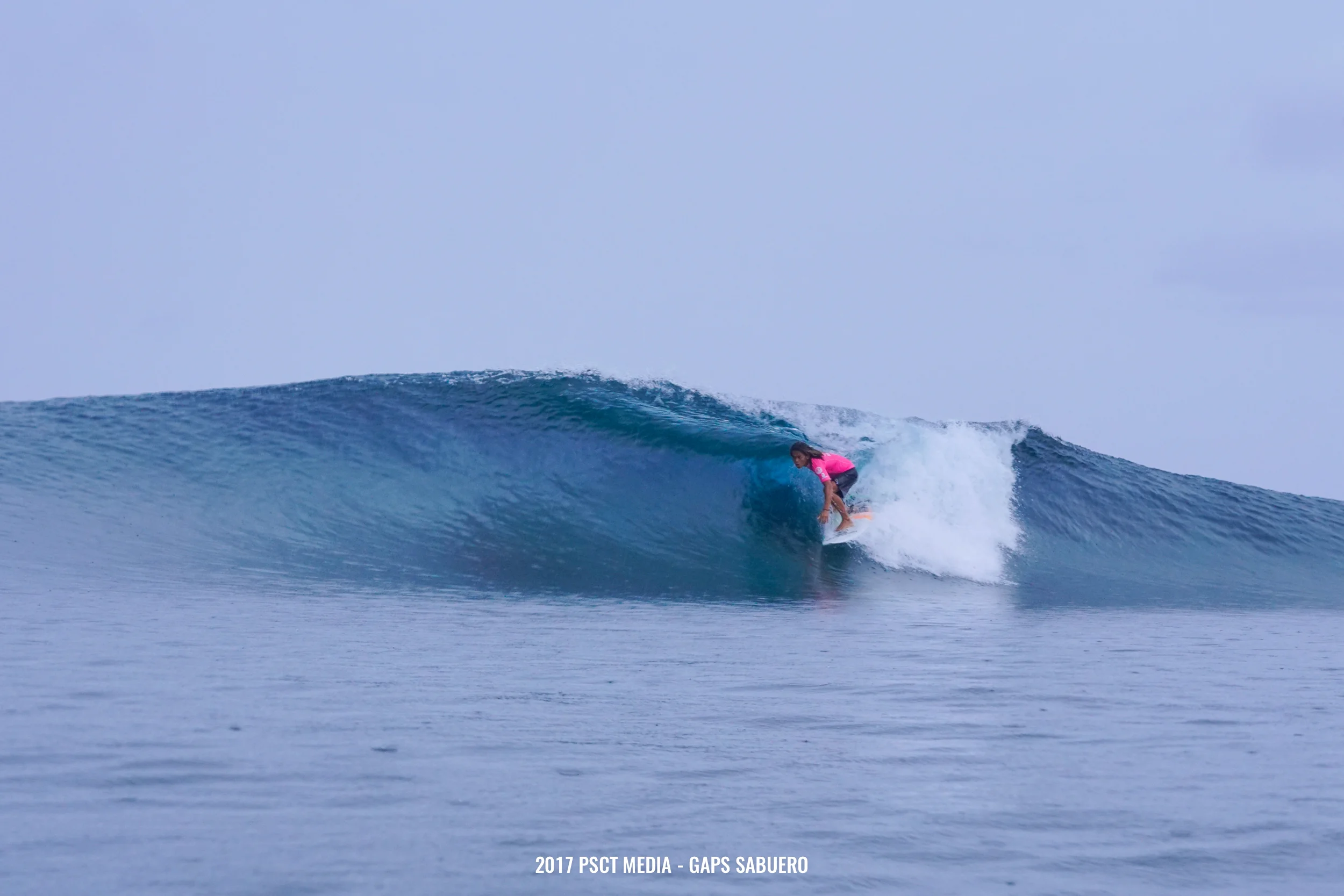 John Mark Tokong, 2015 WSL WQS Siargao International Surfing Cup champion, about to get barreled during the last day of the competition. Photo by Gaps Sabuero.